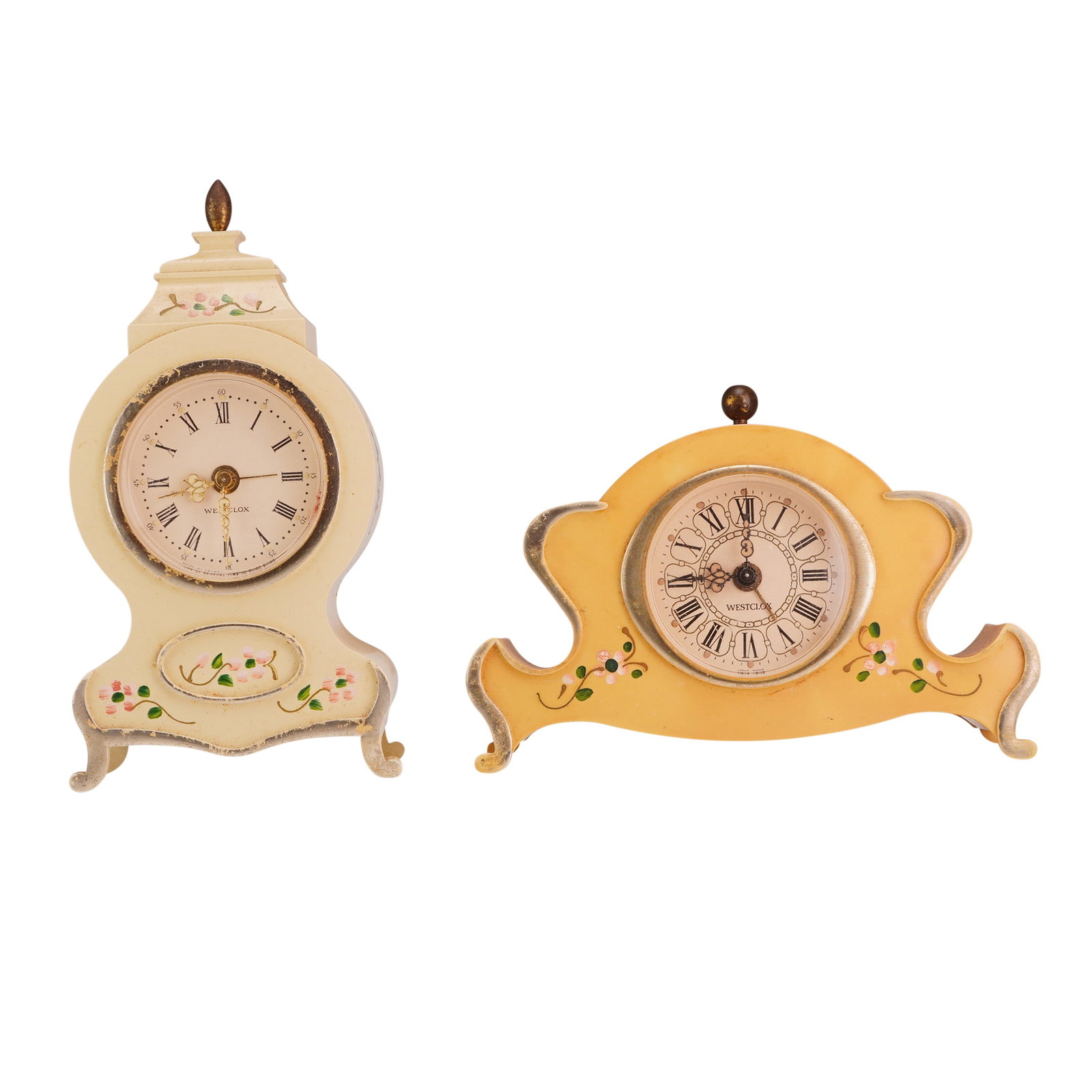 2pc Westclox Hong Kong Miniature Hand Painted Alarm Clocks: A pair of vintage miniature boudoir clocks manufactured by Westclox in Hong Kong. Both clocks are constructed from molded cases and feature mechanical wind-up movements with integrated alarm functions