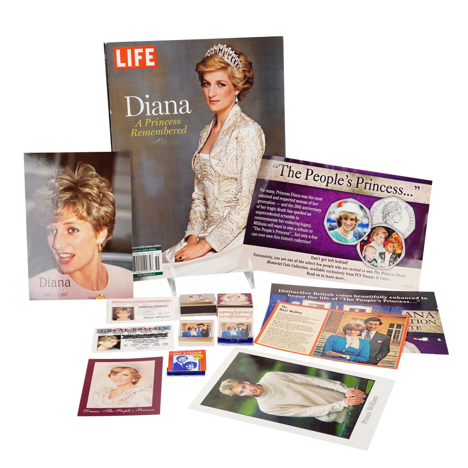 Charles & Diana Royal Family Ephemera and Commemorative Memorabilia Collection: This lot of Charles & Diana Royal Family ephemera features a diverse assortment of commemorative items and printed media. The centerpiece is a 2020 reissue of the LIFE Magazine special edition, "Diana