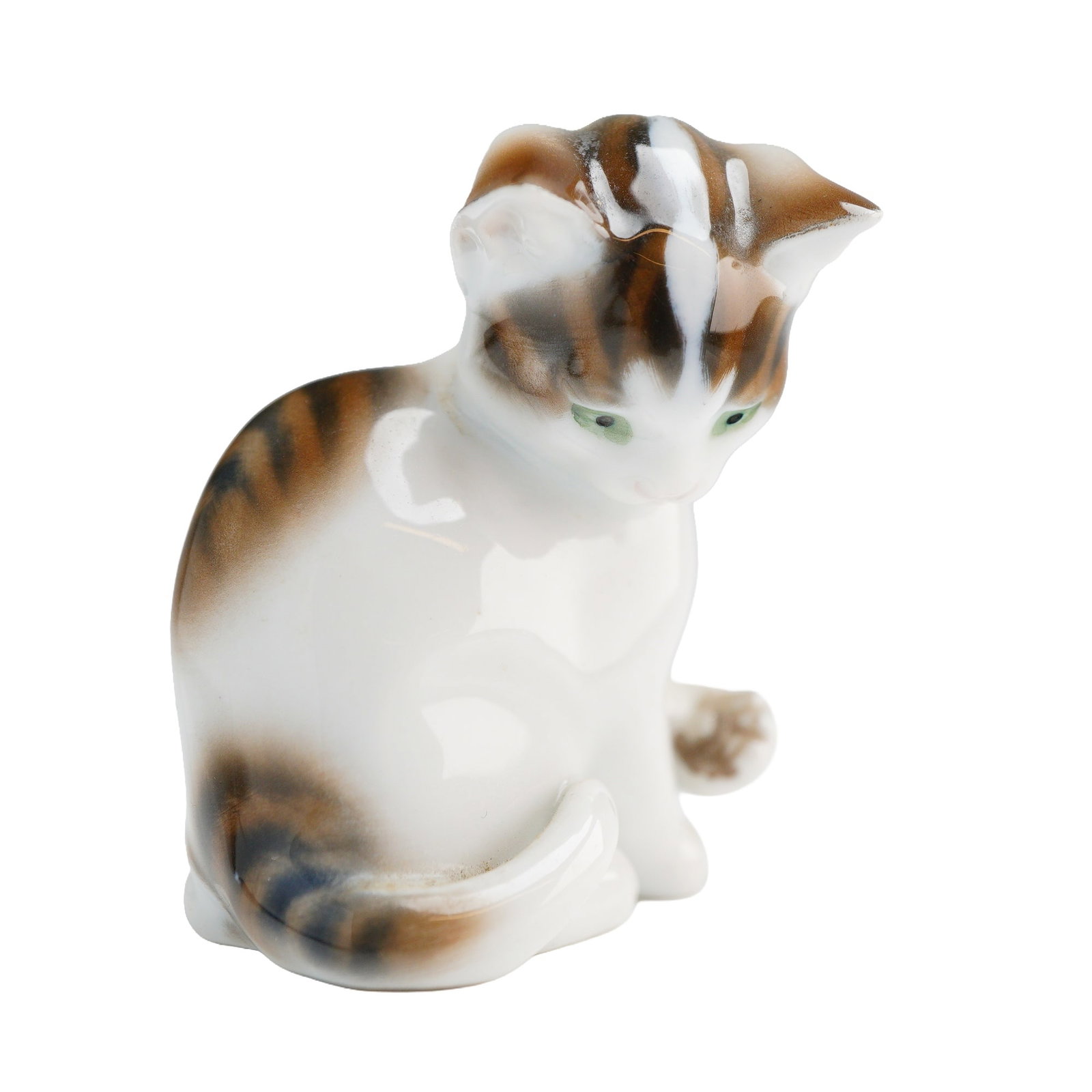 Rosenthal Hand-Painted Glazed Porcelain Seated Kitten Figurine: A single glazed porcelain figurine manufactured by Rosenthal, Germany, depicting a seated kitten in a playful posture. The figurine features white primary coloration decorated with hand-painted brown 