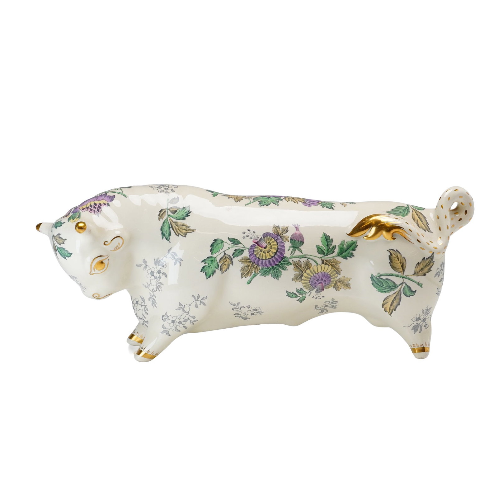 Wedgwood Queen's Ware Floral Taurus the Bull Designed by Arnold Machin: This ceramic figurine is a Wedgwood Queen's Ware Taurus the Bull, designed by Arnold Machin. The piece is modeled in a highly stylized, rounded form with a creamy-white glaze. It is decorated with ove