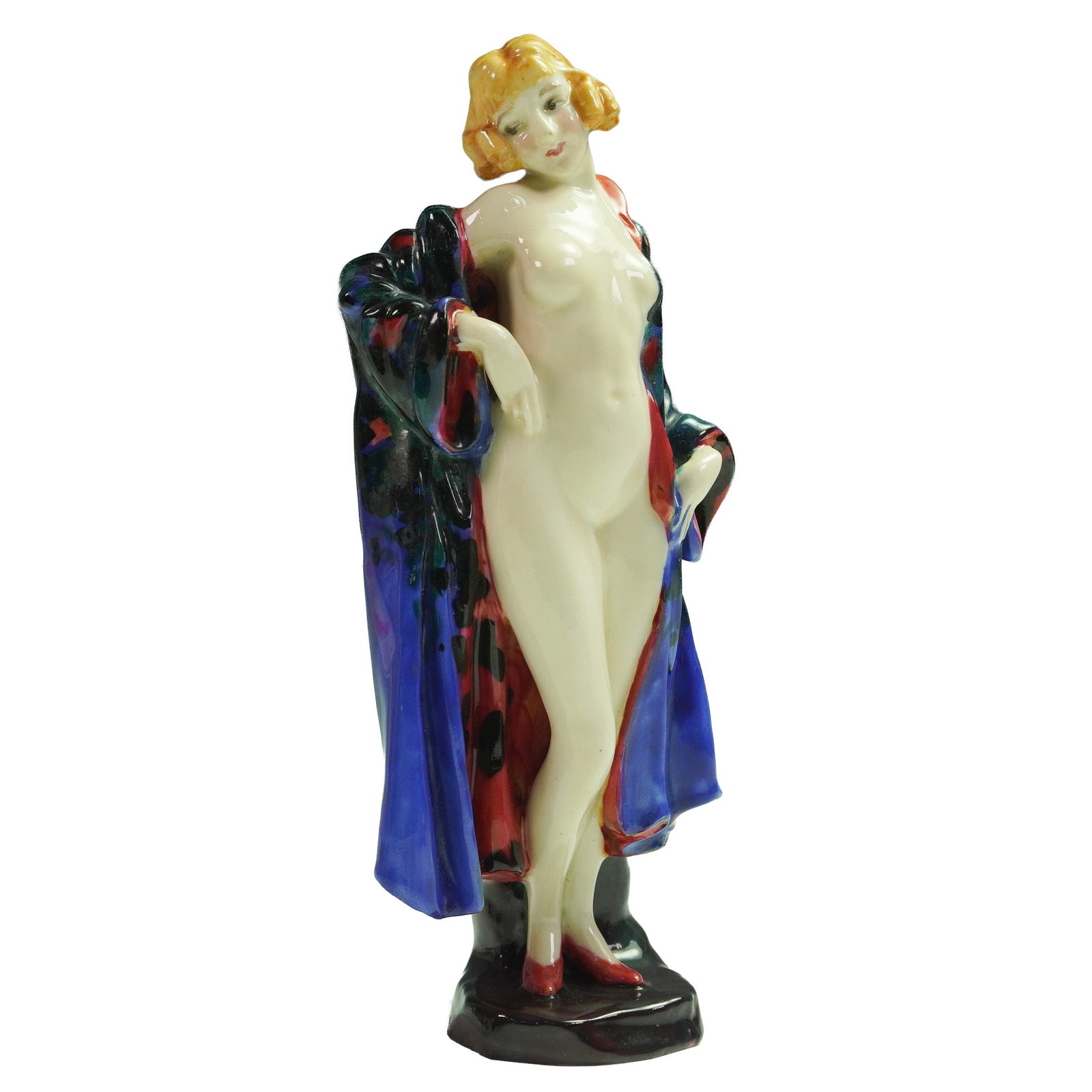 Royal Doulton Figurine, The Bather HN774: The piece features a standing female nude figure partially draped in a patterned robe of dark blue and red with interior red detailing. The figure stands on a black square base, with the backstamp rea