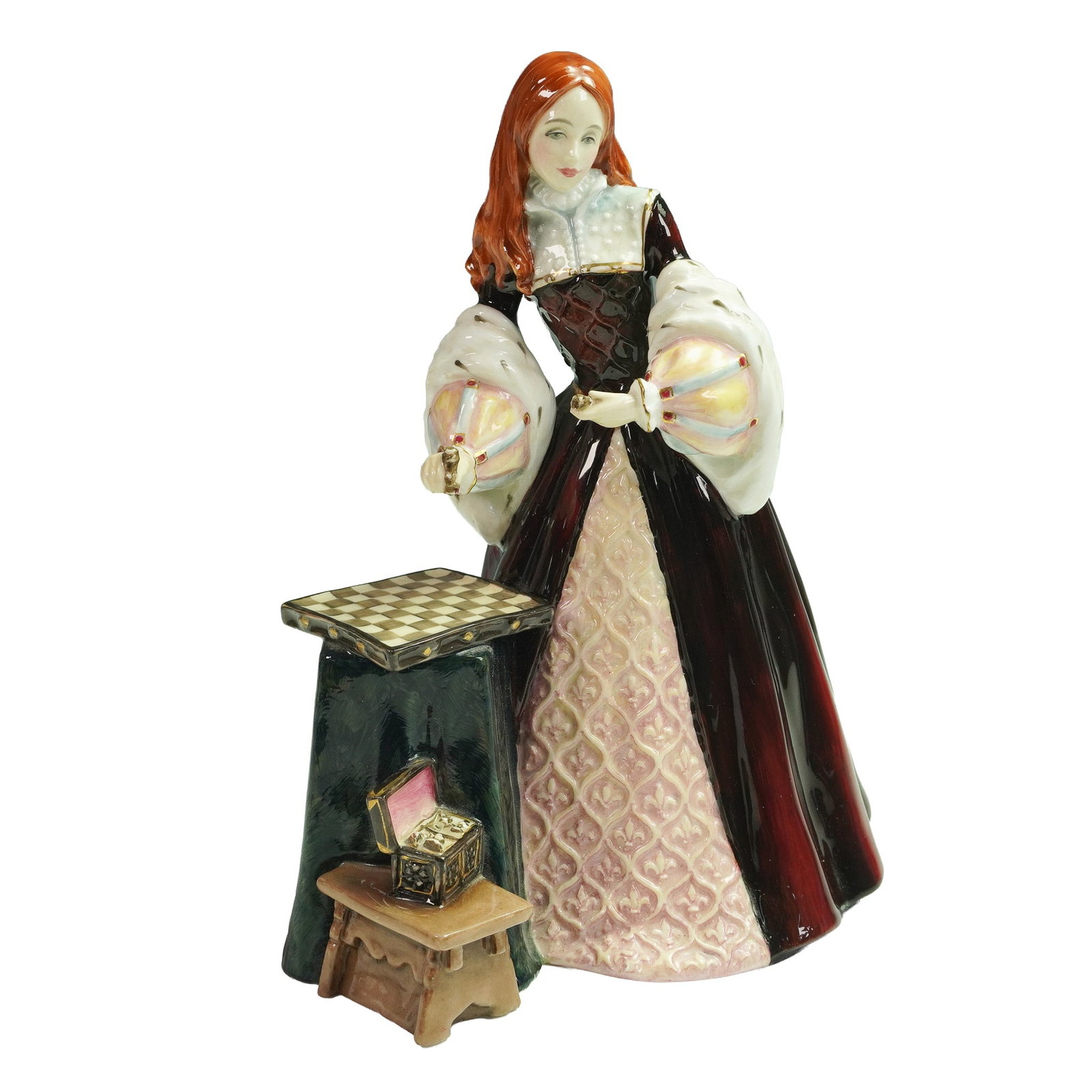 Royal Doulton Prototype Colorway Figurine, Princess Elizabeth: This figurine depicts Princess Elizabeth, later Queen Elizabeth I, dressed in period Tudor attire with a burgundy and cream gown featuring diamond-patterned detailing, elaborate puffed sleeves with lu