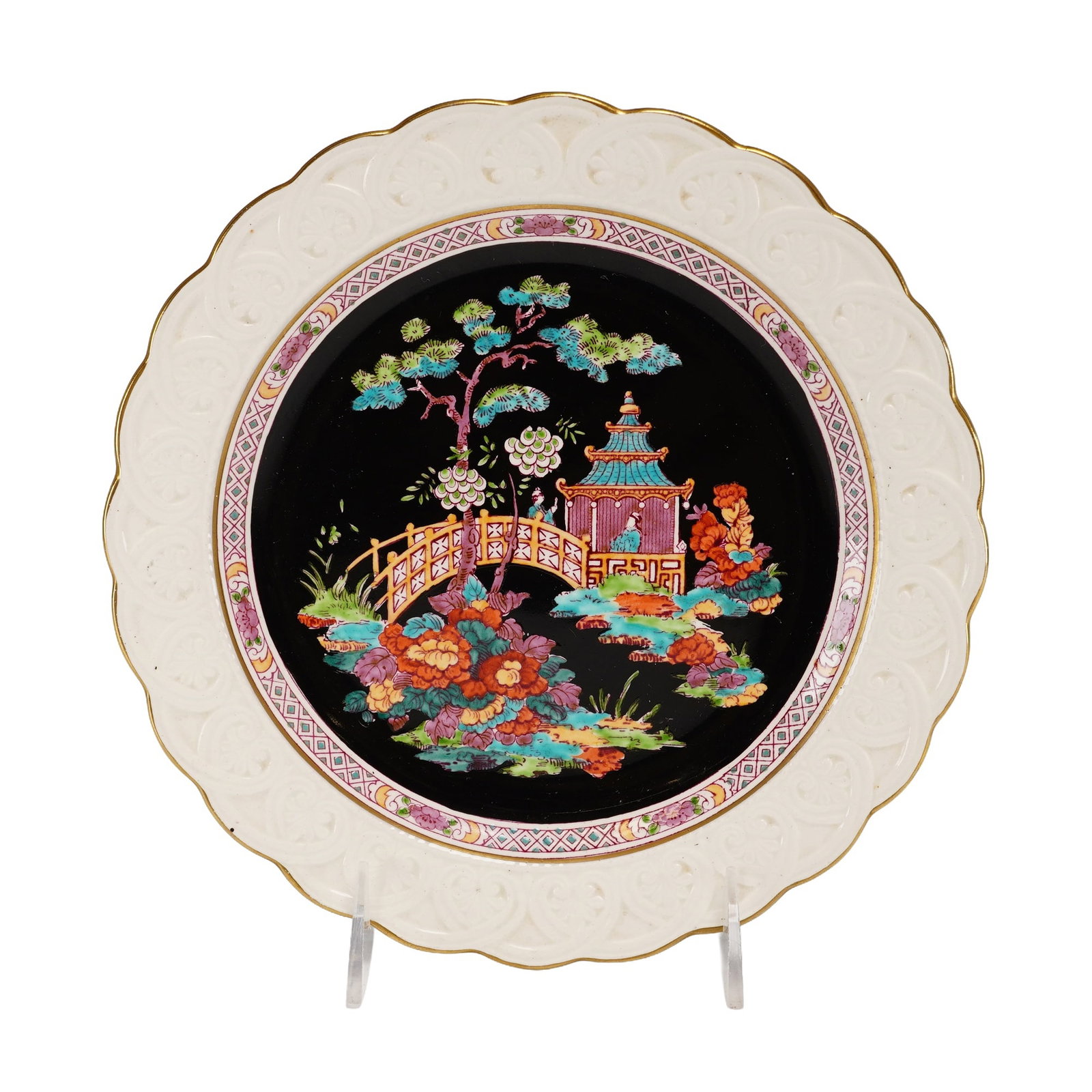 Wedgwood Fairyland Nizami Chinoiserie Earthenware Plate: This Wedgwood earthenware cabinet plate features a central Chinoiserie landscape scene executed in vibrant polychrome enamels against a black ground. The decoration depicts figures on a bridge and wit