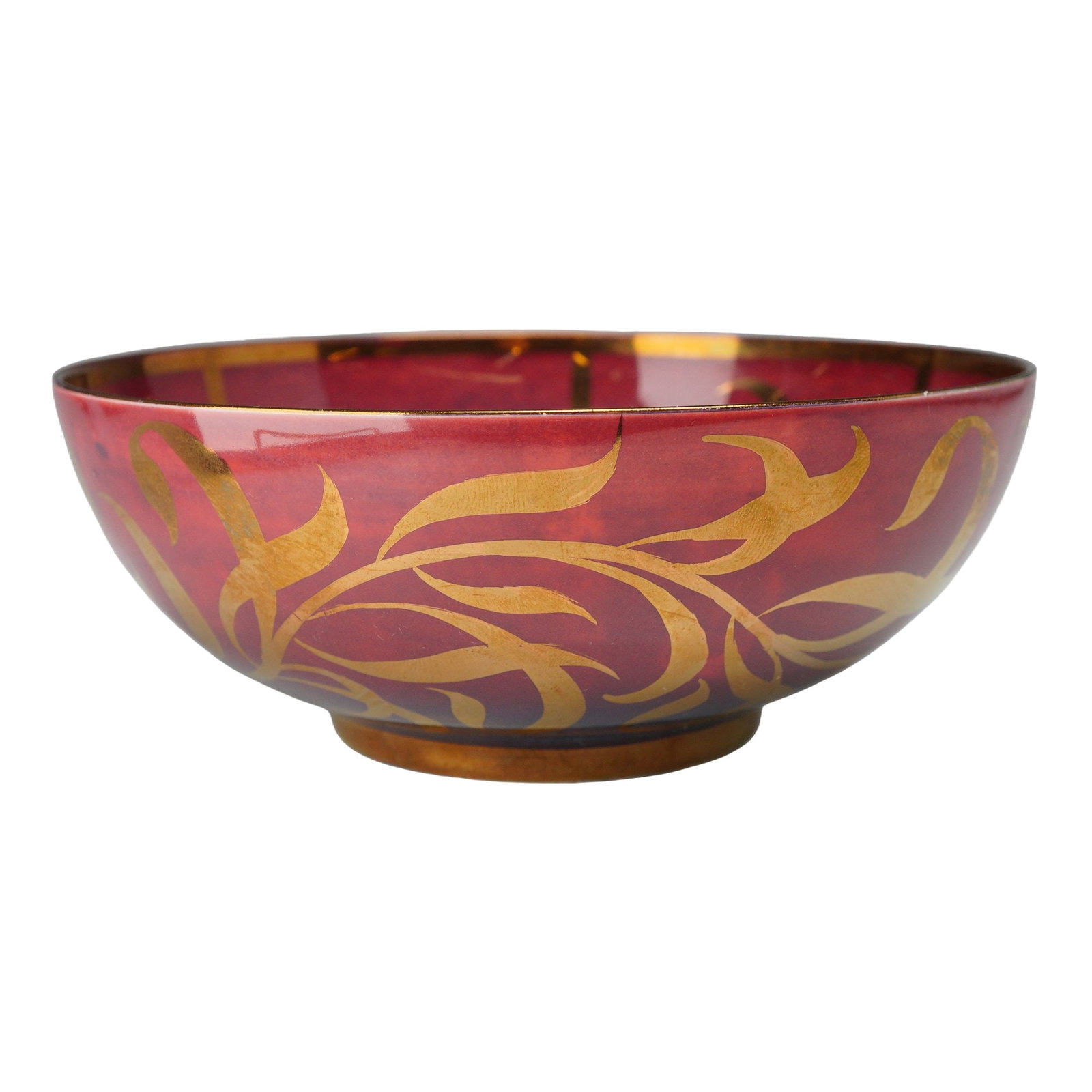 Wedgwood Luster Porcelain Bowl: A circular footed porcelain bowl manufactured by Wedgwood in England. The bowl features a flared body resting on a short unglazed footrim. The exterior is finished in a mottled ruby luster glaze and d