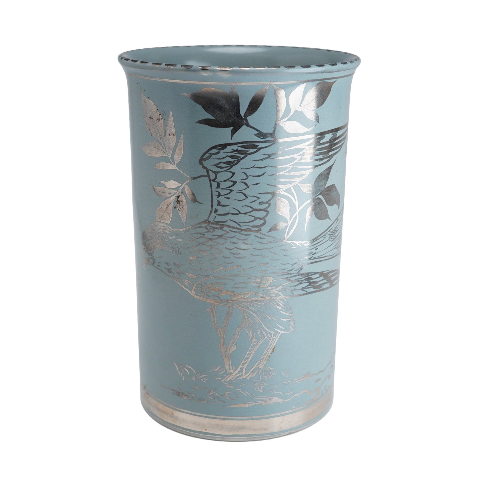 Wedgwood Alfred Powell Silver Lustre Decorated Vase: A Wedgwood earthenware cylindrical vase designed by Alfred Powell. The vessel features a matte powder-blue glaze decorated with silver lustre. The hand-painted design depicts two birds of prey; one is