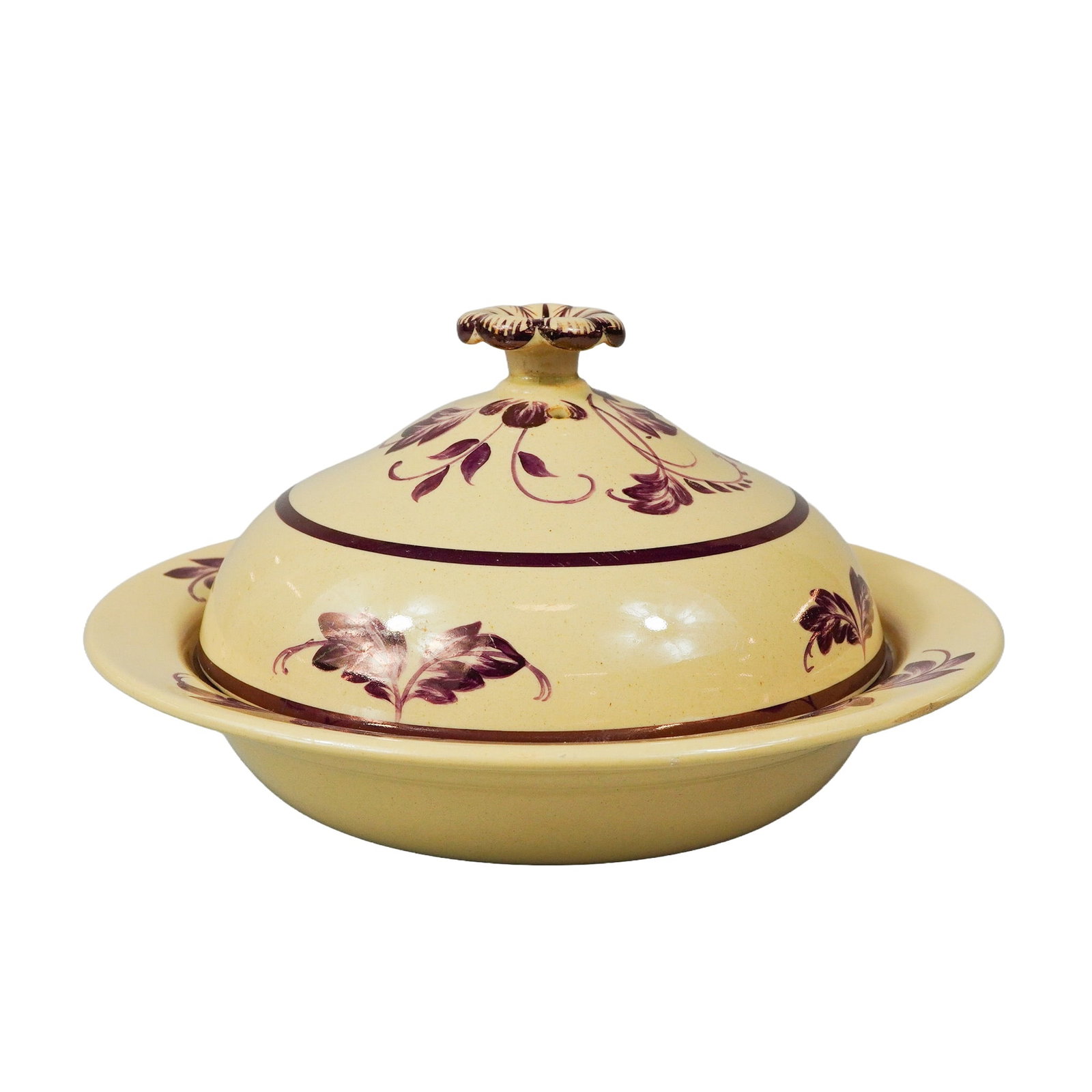 Wedgwood Maroon Luster Hand-Painted Salt-Glazed Covered Dish: A Wedgwood earthenware covered muffin dish consisting of a circular base and a domed lid with a floral finial. The piece is made of salt-glazed earthenware, featuring hand-painted maroon luster decora