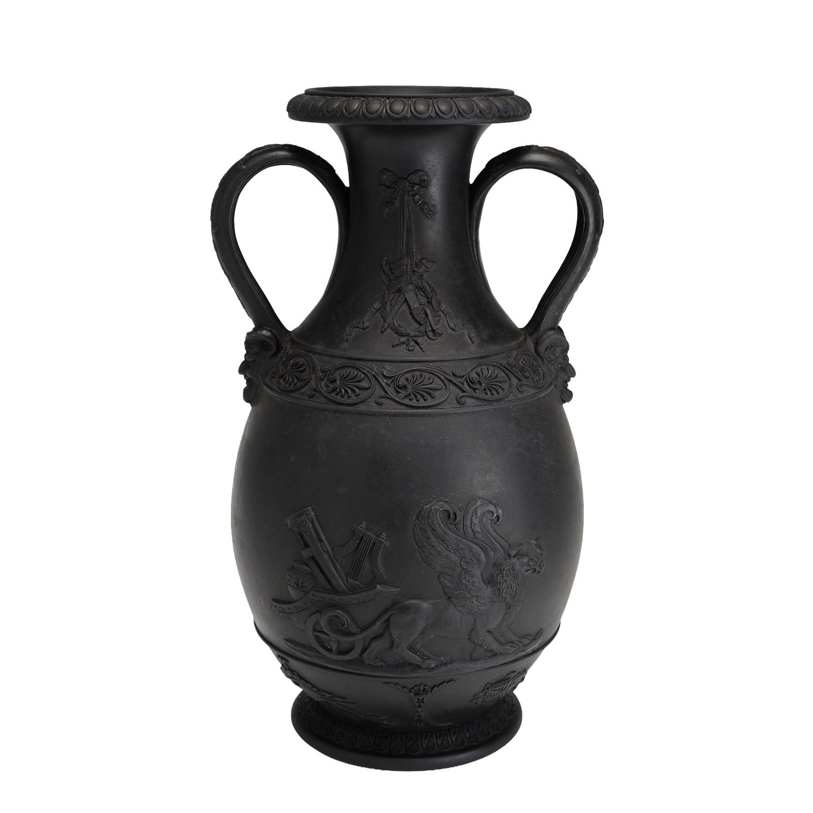 Wedgwood Black Basalt Two-Handled Amphora Vase: This neoclassical amphora-shaped vase is manufactured by Wedgwood in fine-grained, unglazed matte black basalt stoneware. The form features two scrolled handles that terminate at the shoulder with mol