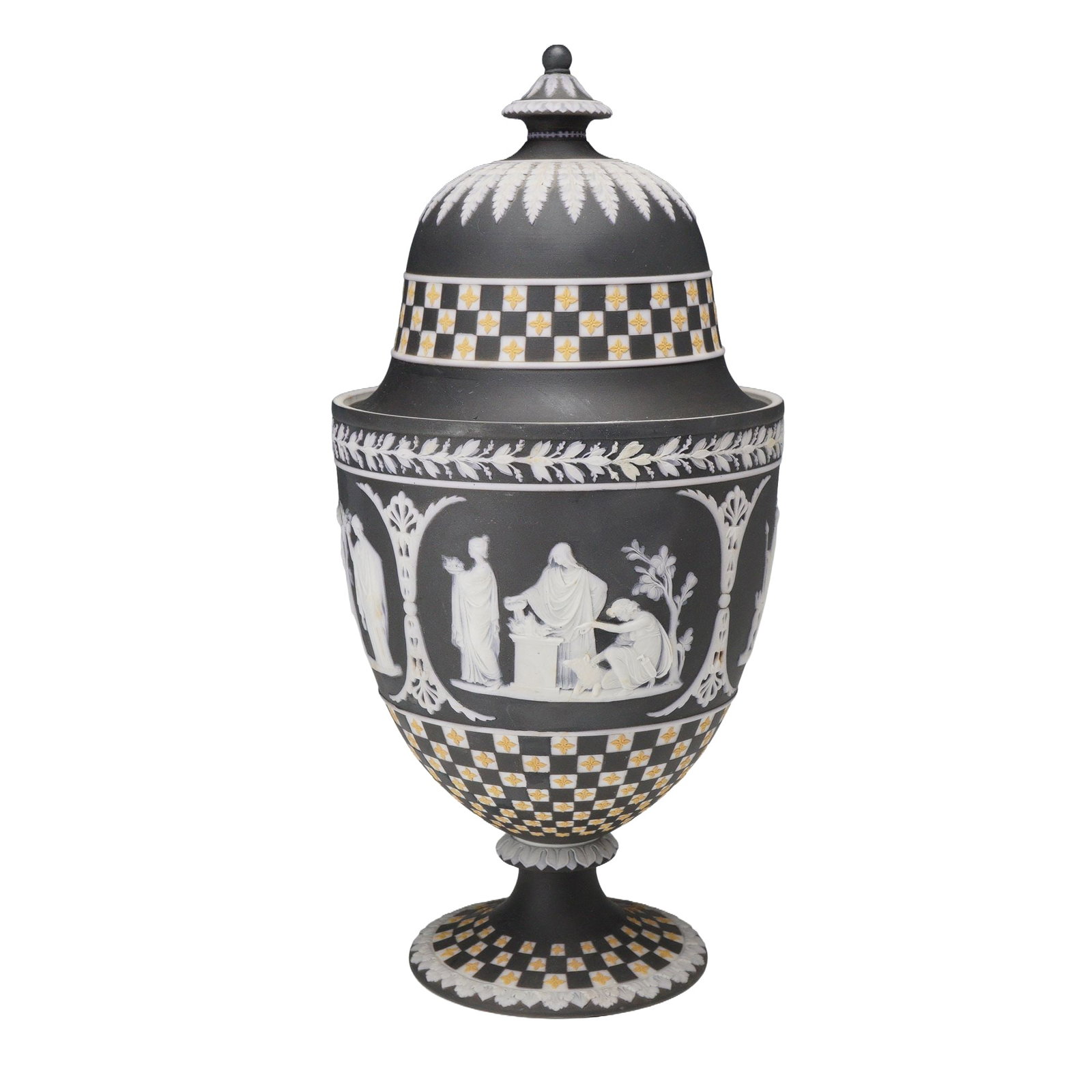 Wedgwood Tri-Color Black Basalt Jasperware Dice Pattern Lidded Urn: A Wedgwood tri-color black basalt jasperware lidded urn featuring the signature dice pattern. This piece is a jasper dip variety, with a black-colored exterior over a white stoneware body, as evidence