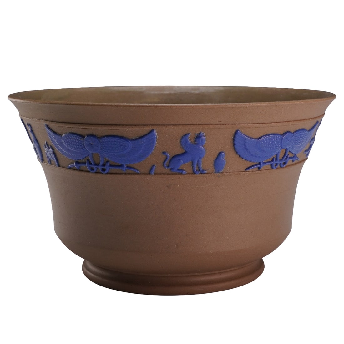 Wedgwood Greenish-Grey and Blue Egyptian Jasperware Bowl: This Wedgwood jasperware bowl features a greenish-grey stoneware body accented with applied blue relief sprigged decoration in the Egyptian Revival style. The bowl is designed with a flared circular b