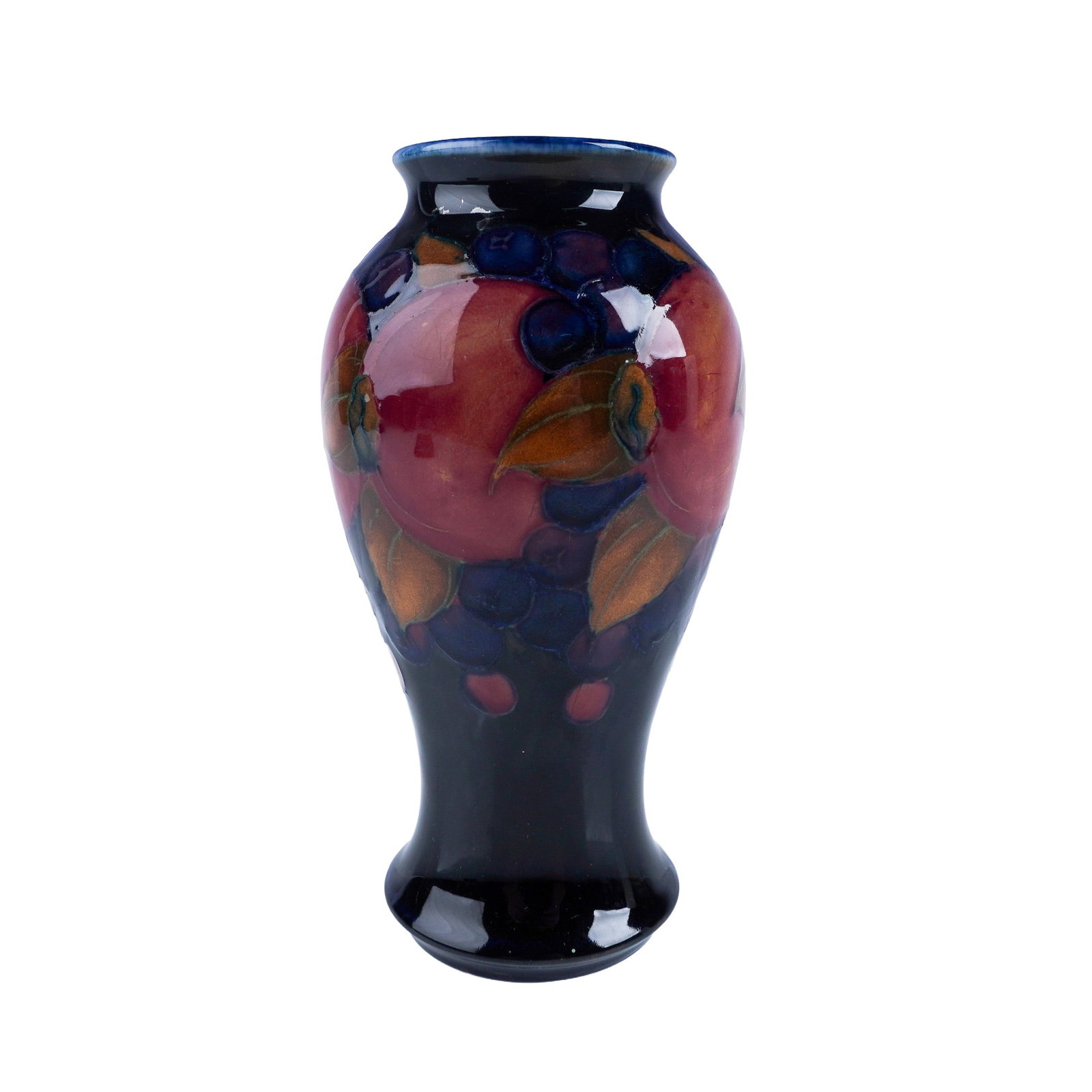 Moorcroft Pottery Pomegarante Vase: A charming Moorcroft vase featuring the timeless Pomegranate pattern. This hand decorated piece highlights Moorcroft's signature craftsmanship, with vibrant depictions of pomegranates and berries in b
