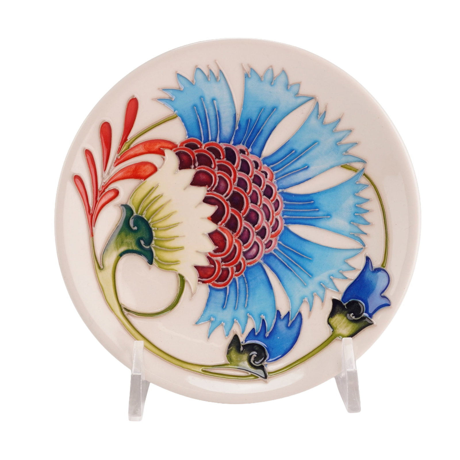 Moorcroft Pottery by Emma Bossons Floral Motif Pin Dish, Cornflower: The limited edition, 20 of 75, piece is constructed of earthenware and features the factory's signature tube-lined decoration technique. The design depicts a stylized floral motif with a large flower 