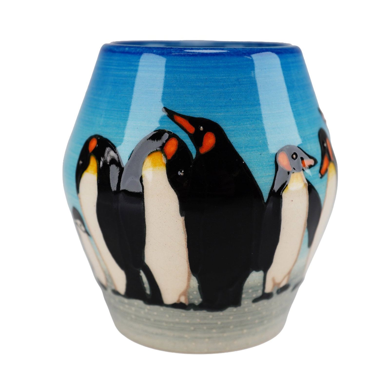 Dennis Chinaworks Sally Tiffin Miniature Pottery Vase, Penguins: A small, bulbous-bodied ceramic vase produced by Dennis Chinaworks. The piece is constructed of glazed earthenware featuring hand-painted tube-lined decoration. The design consists of a continuous fri