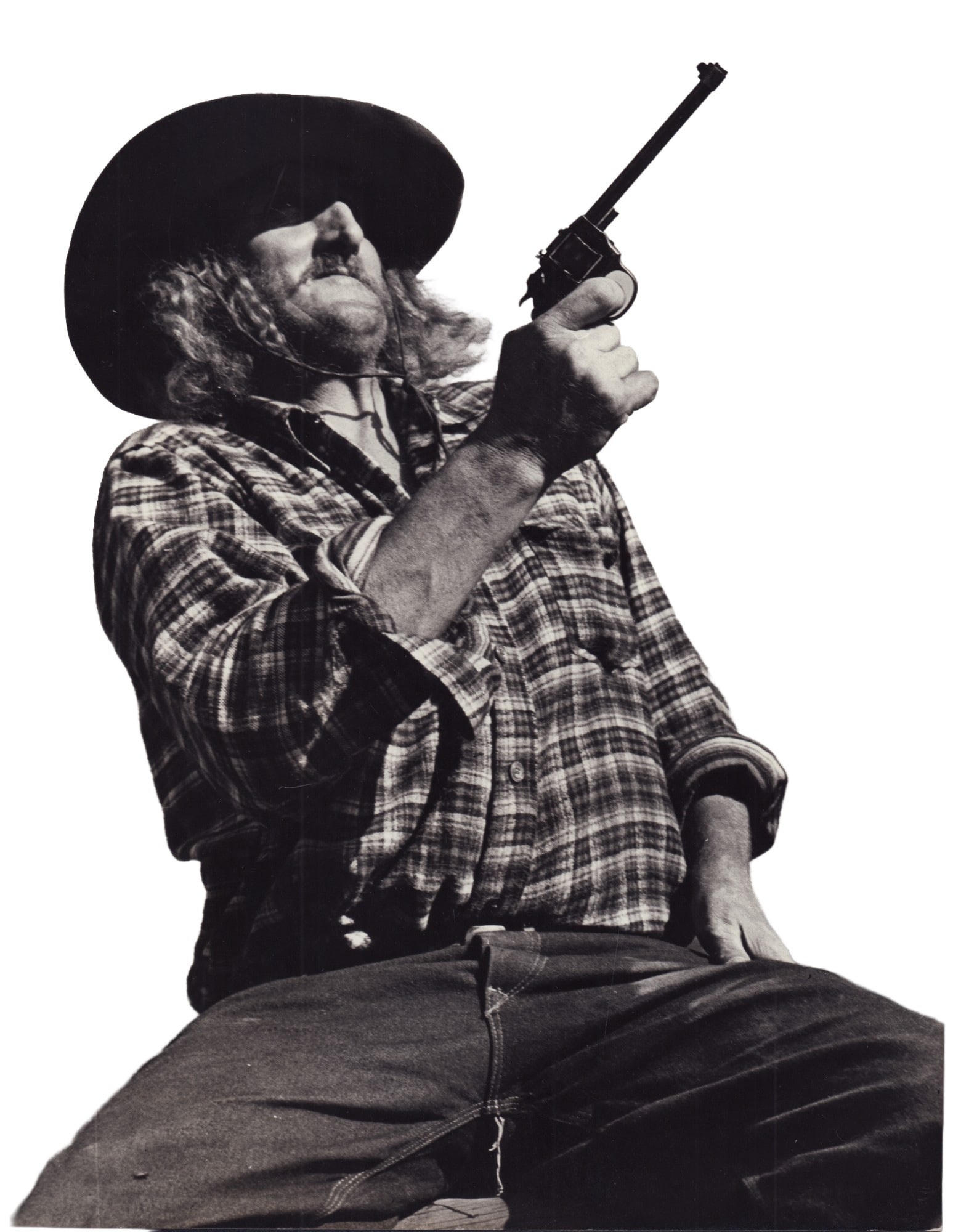 Eliot Elisofon, Tom McLaughlin as Custer Scout Gelatin Silver Print: An original gelatin silver print on fiber paper by LIFE magazine photographer Eliot Elisofon (American, 1911-1973). The photograph is a dramatic, low-angle portrait of Tom McLaughlin, a truck driver f