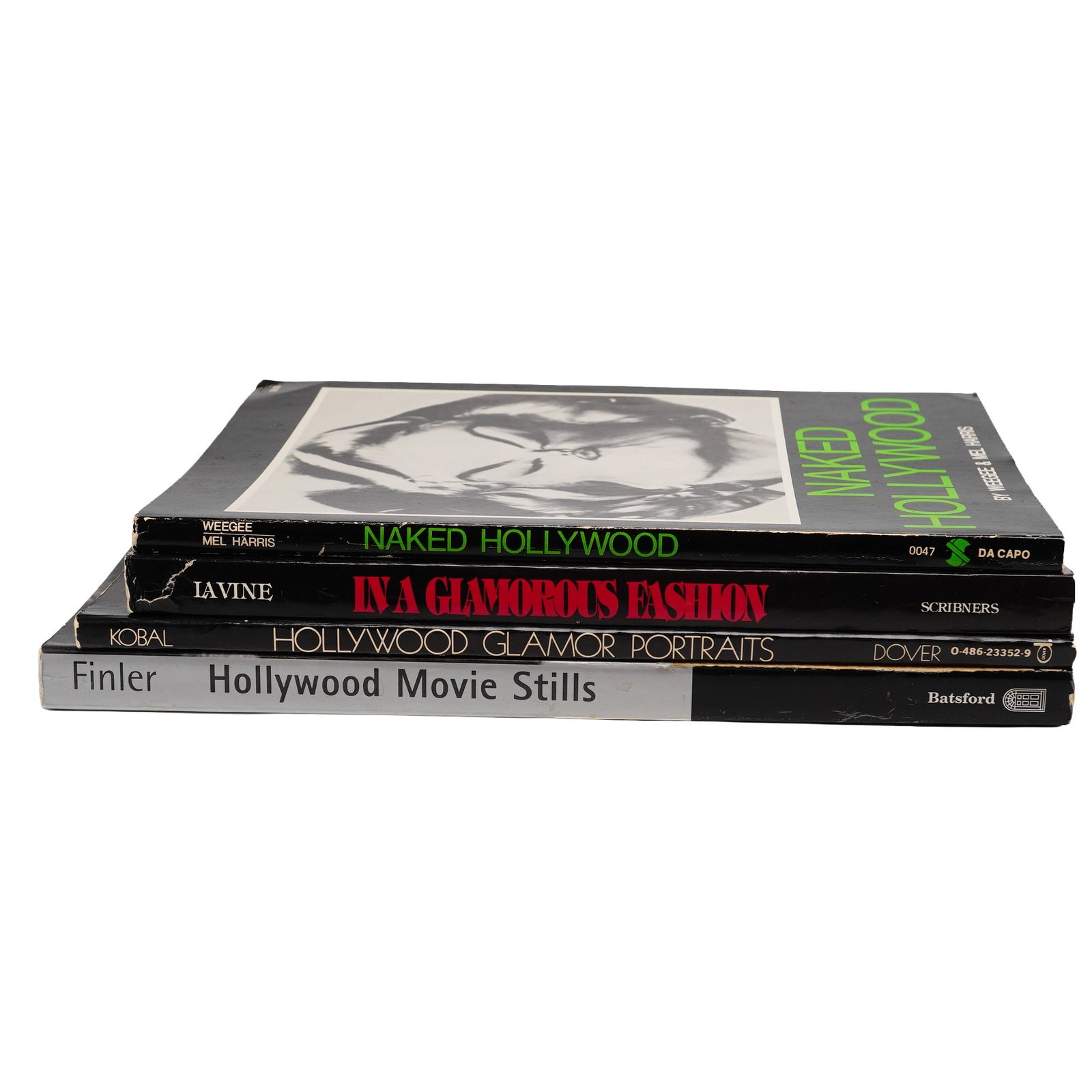 4pc Hollywood Theme Books on Photography and Costume Design: This lot of 4 Hollywood theme books includes a selection of trade paperback volumes focused on the history of film photography, portraiture, and costume design. The group comprises Naked Hollywood by 