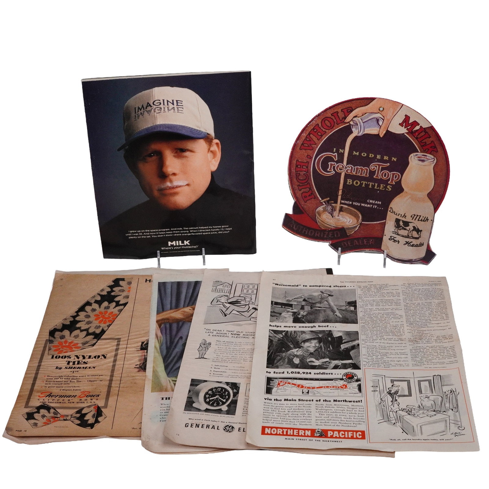 8pc Collection of Vintage Advertising & Magazine Memorabilia, 1940s: Group of early advertising and magazine memorabilia including original 1946 and 1949 magazine pages featuring automotive, travel, and consumer product ads, a vintage die-cut "Cream Top Milk" sign, and