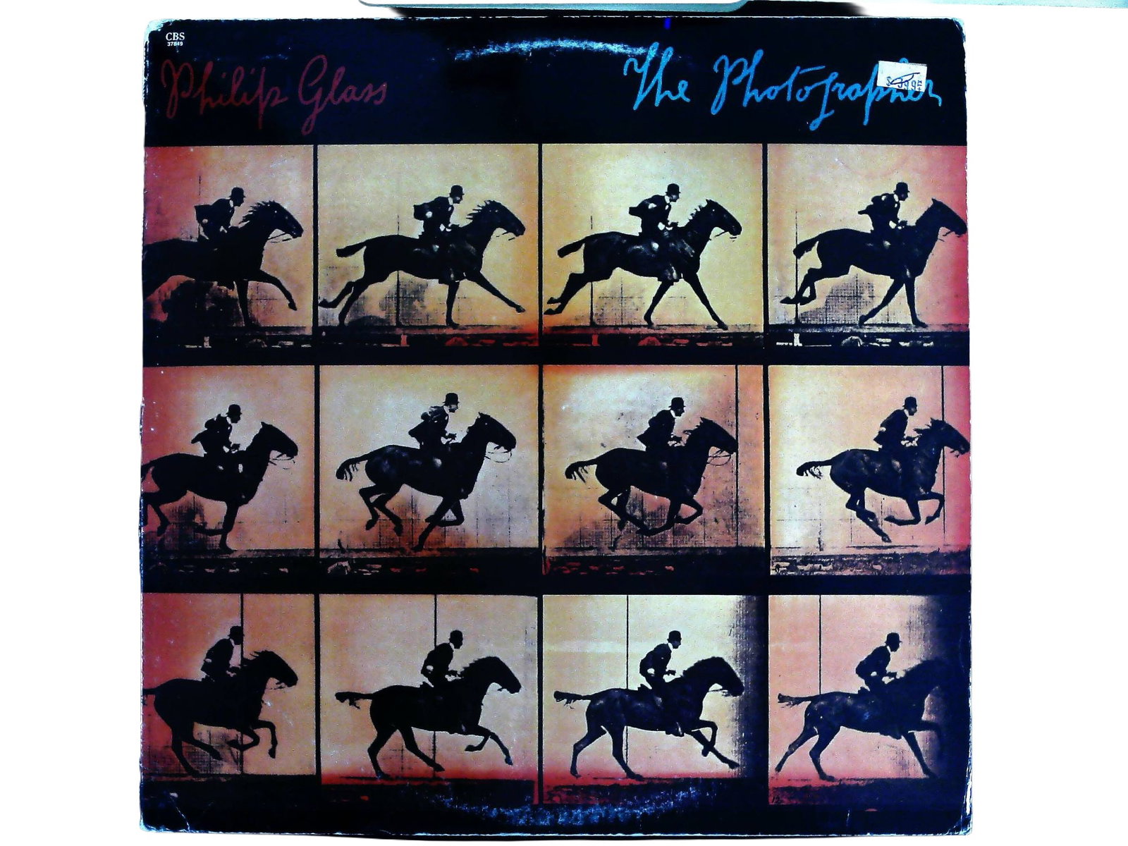 Philip Glass - The Photographer - CBS 37849 Vinyl Record Album: Philip Glass - The Photographer. Released by CBS Records in 1983, catalog number 37849. This record in original album cover features a front sleeve design with a grid of silhouette motion photographs 