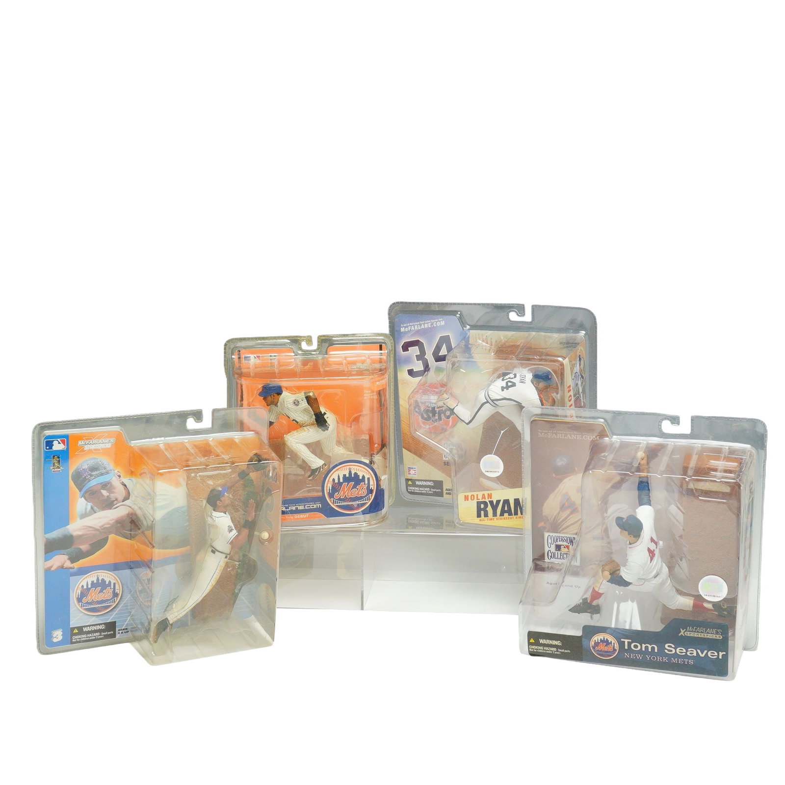 A Collection of 4pc McFarlane Toys MLB Baseball Action Figures: This lot features a collection of 4pc NBA figurines in boxes, which includes four factory-sealed Major League Baseball action figures from the McFarlane Toys McFarlane's Sportspicks and Cooperstown Co