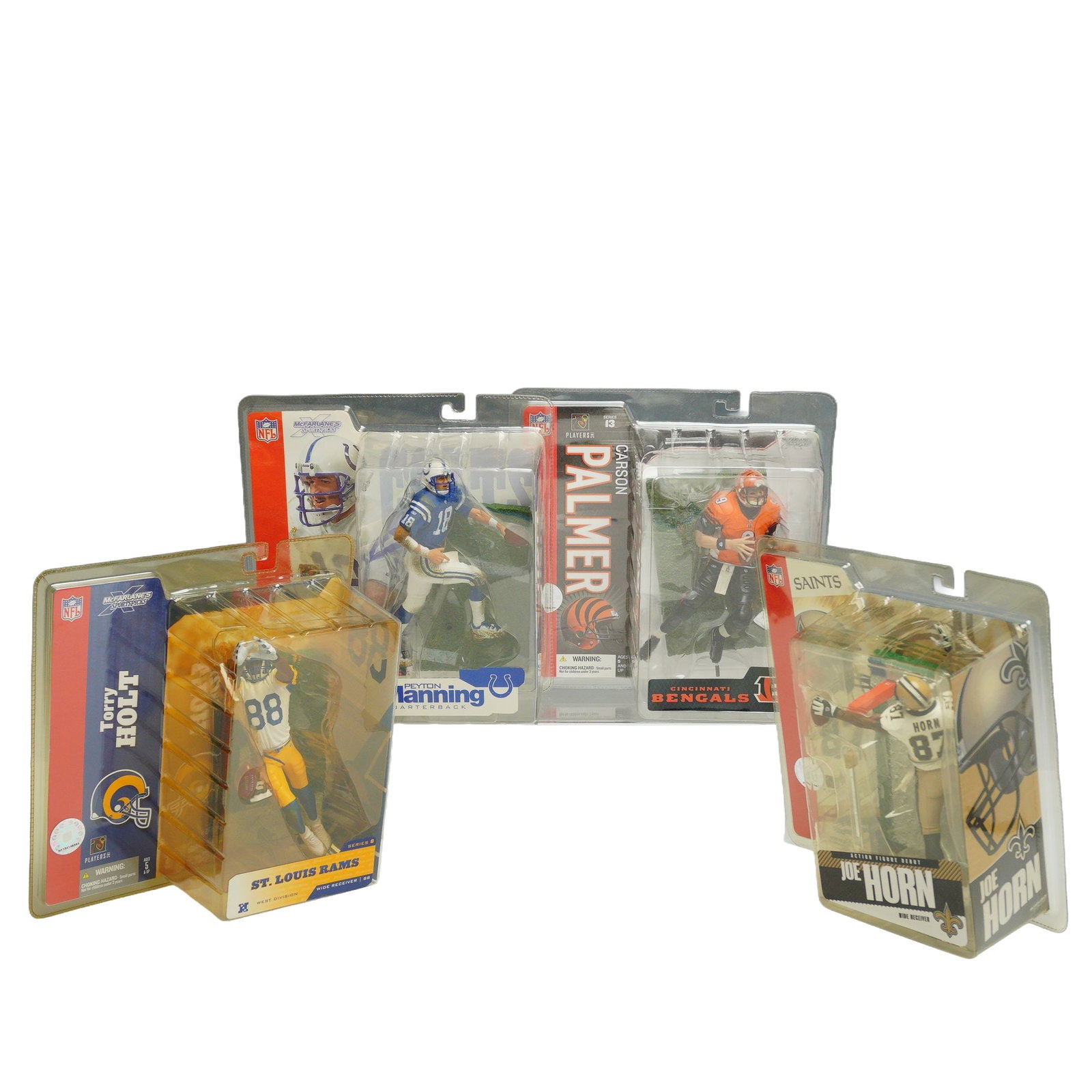 4pc NFL McFarlane's Sportspicks Action Figures in Original Packaging: A collection of 4pc NFL action figures from the McFarlane's Sportspicks line produced by McFarlane Toys. Each figurine is presented in its original retail clamshell packaging. The collection includes 