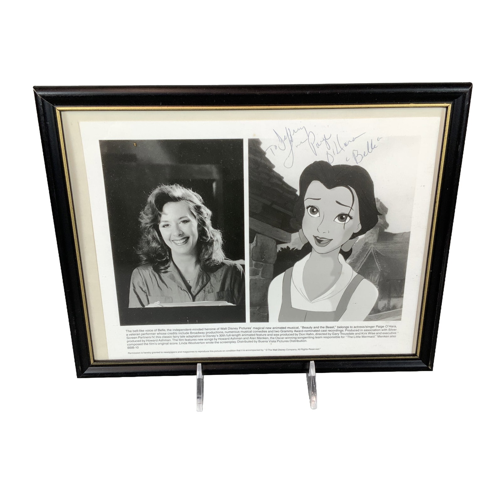Framed Autographed Photo of Paige O'Hara and Belle from Disney's Beauty and the Beast: This framed, autographed publicity photograph for Walt Disney Pictures' 1991 feature Beauty and the Beast features a composite of two black-and-white images: a film still of Belle and a promotional he