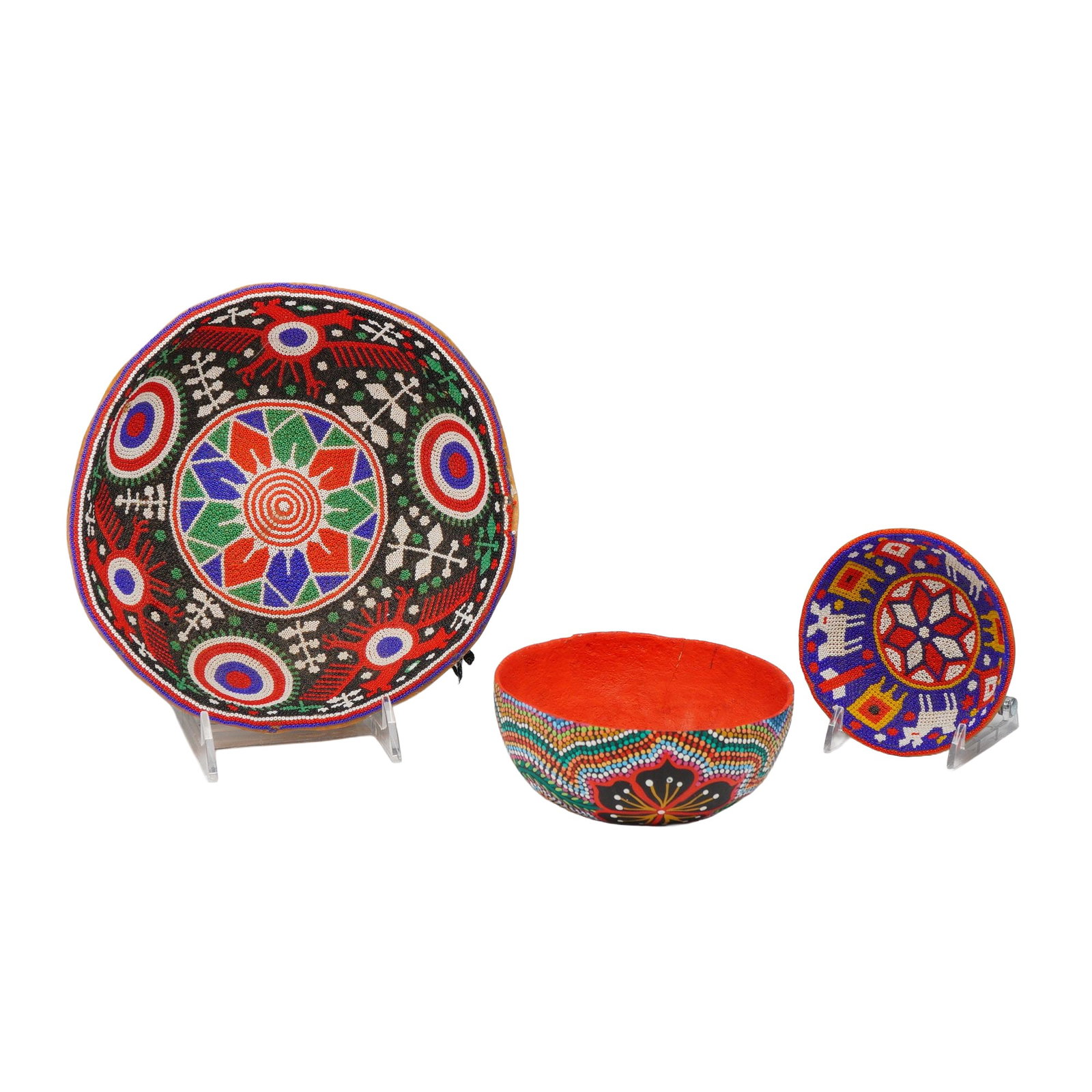 3pc South American Beaded and Hand Painted Gourd Bowls: A lot of three South American decorated gourd bowls, including two featuring intricate interior beadwork and one with a hand-painted exterior. The collection includes a large bowl with an interior dec