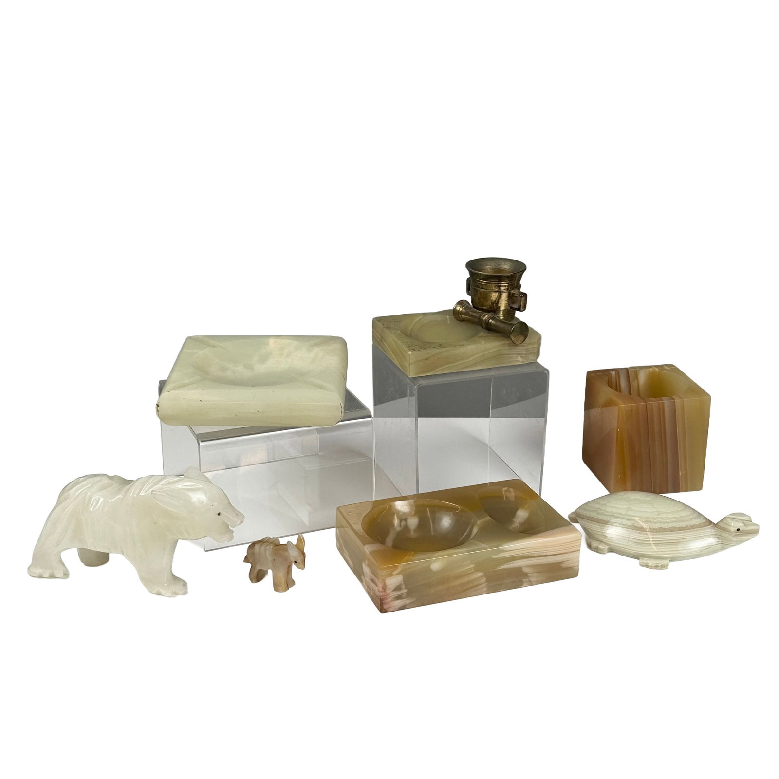 7pc Collection of Vintage Carved Onyx and Alabaster Desk Accessories and Animal Figurines: A collection of seven vintage carved stone desk accessories and animal figurines fashioned from banded onyx and alabaster in shades of cream, sage green, and amber brown. The group includes three shal
