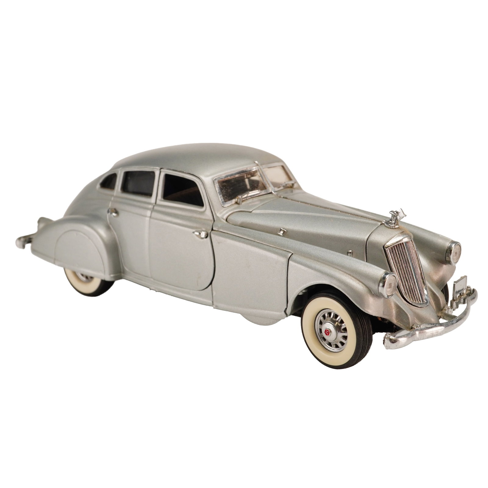 The Danbury Mint Classic Model Car, 1933 Pierce Silver Arrow: This 1:24 scale replica of a 1933 Pierce-Arrow Silver Arrow is part of the Danbury Mint Classic Cars Collection. The model is constructed from die-cast metal with plastic and rubber components. It fea
