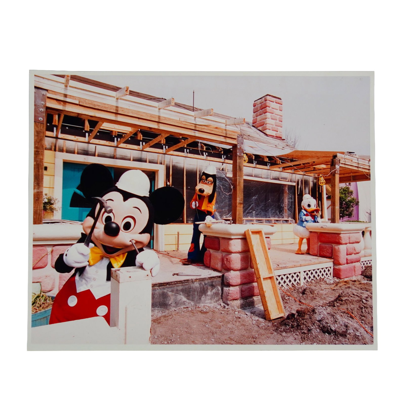 Original Walt Disney World Mickey's Toontown Fair Remodeling Press Photograph: A 1996 press photo for the remodeling of Mickey's Toontown Fair at Walt Disney World Magic Kingdom. Dimensions: 8"L x 0.25"W x 10"H Date or Era: 1996 Provenance: From the estate of Ray Fisher. Weight: