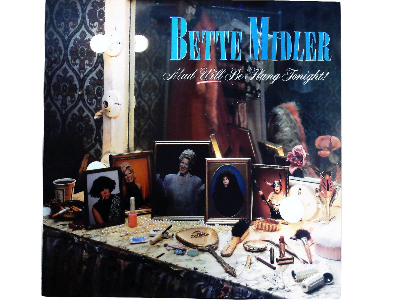 Bette Midler Mud Will Be Flung Tonight! 1987 Atlantic Records LP: A vintage 12-inch vinyl long-playing (LP) record featuring the 1987 comedy album by Bette Midler titled Mud Will Be Flung Tonight! The album was issued on the Atlantic Records label, bearing the catal