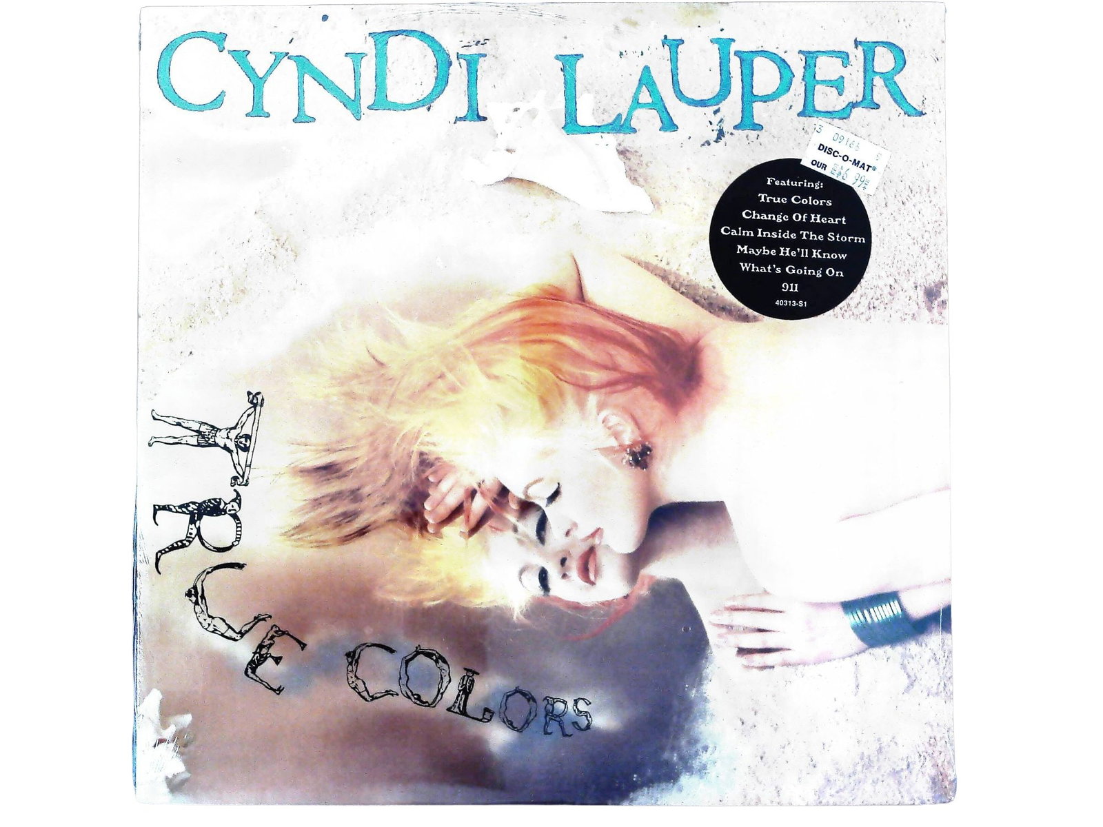 Cyndi Lauper True Colors LP Record Album: Single vintage cardboard LP record album sleeve for the Cyndi Lauper album True Colors, originally released in 1986 by Portrait Records. The front cover features a close-up photographic portrait of th