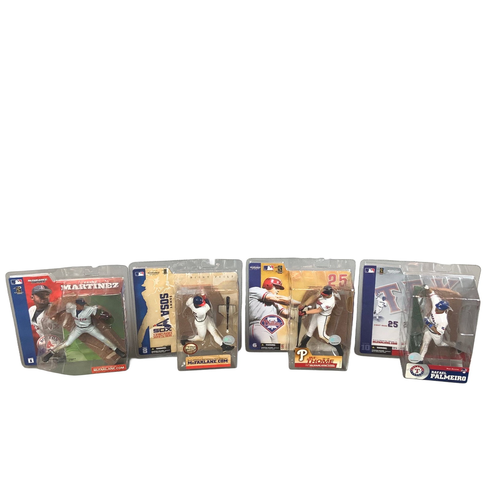 4pc Collection of McFarlane Toys MLB Series Baseball Action Figures in Original Boxes: A collection of four Major League Baseball action figures manufactured by McFarlane Toys, presented in their original factory-sealed blister packs. The set includes a variety of players from distinct 