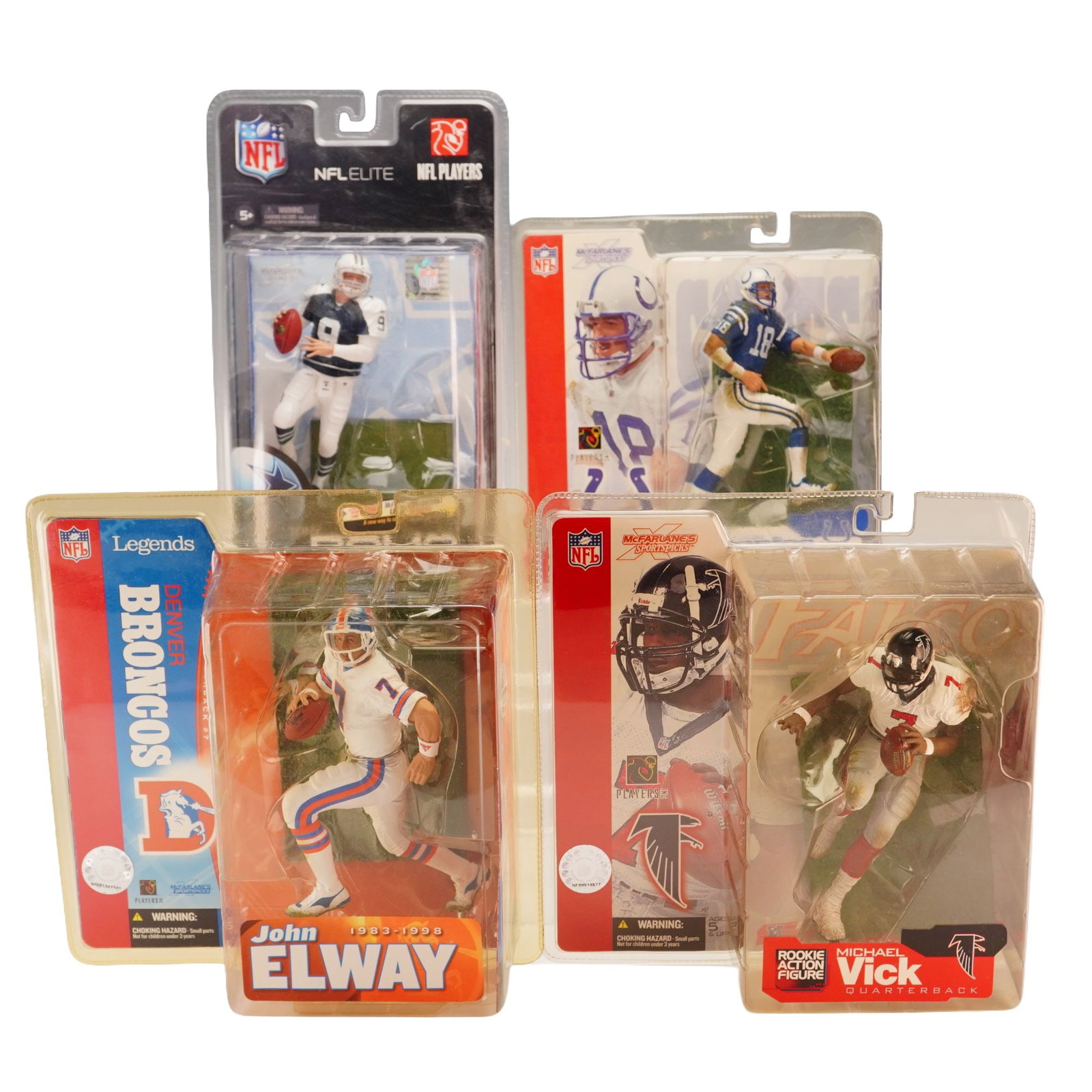 A Collection of Four McFarlane Toys NFL SportsPicks Action Figures in Original Packaging: This collection includes four McFarlane Toys NFL figurines in boxes from the SportsPicks series. Each figure is posed in a dynamic action stance representative of on-field play and is made of molded a