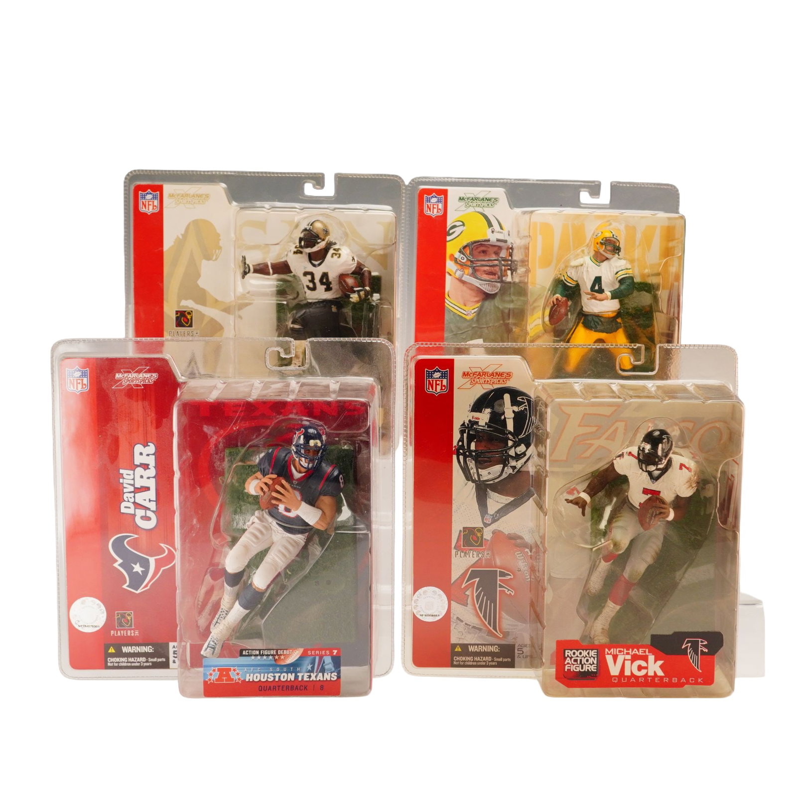 A Lot of Four McFarlane Toys NFL Sportspicks Action Figures: A collection of four McFarlane Toys NFL Sportspicks action figures in original manufacturer packaging. The figures are constructed of molded and painted plastic, displayed on cardstock backings with p