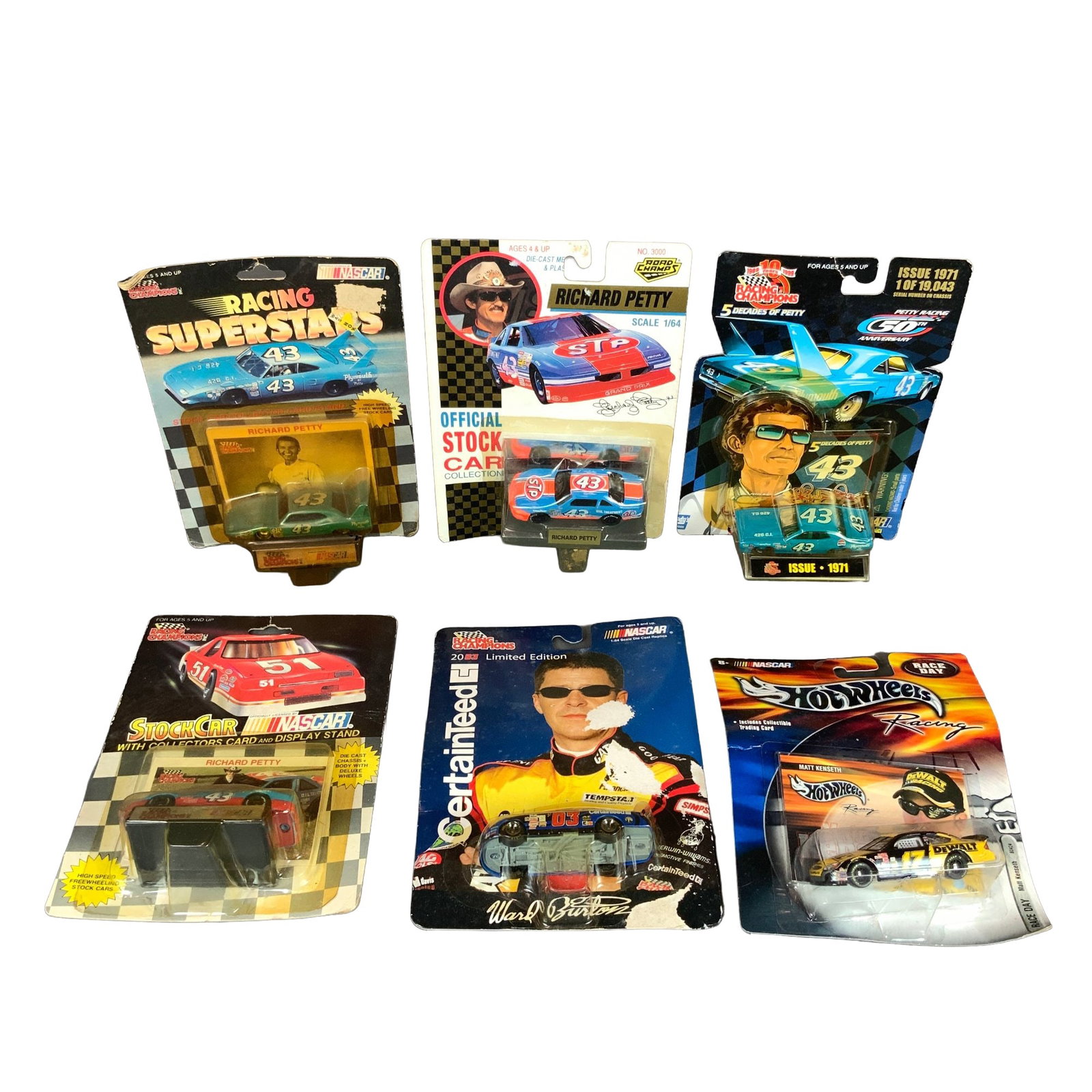 6pc Nascar Car Models: Richard Petty, Ward Burton & Matt Kenseth: A collection of 6pc NASCAR collectible car models in 1:64 scale, primarily featuring Hall of Fame driver Richard Petty. The lot includes various manufacturers and series from the 1990s and early 2000s