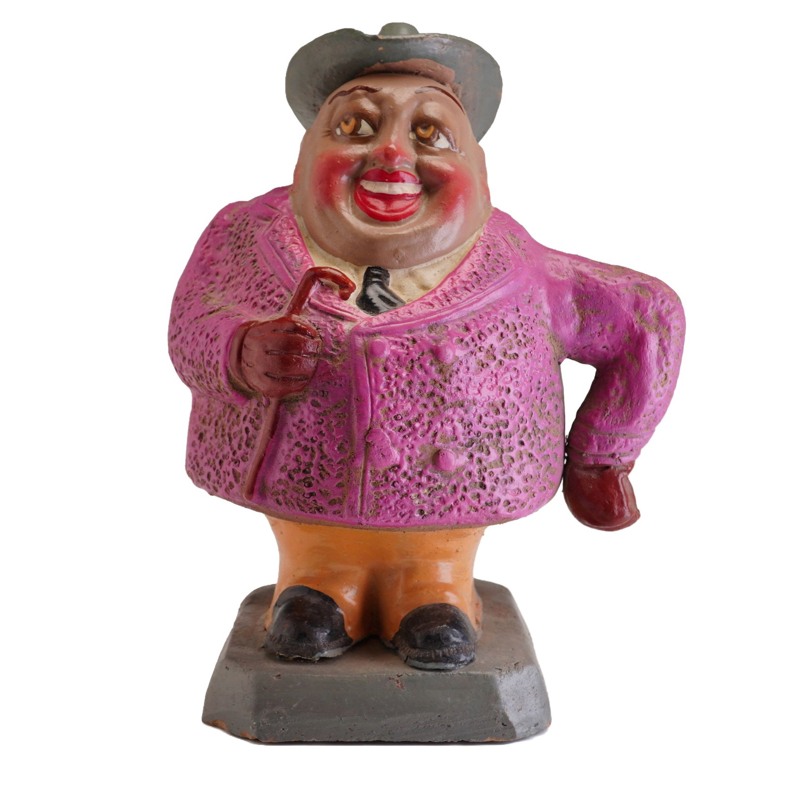 Vintage Folk Art Painted Ceramic Still Coin Bank Depicting a Dapper Gentleman: This vintage still coin bank is constructed of painted ceramic and features a caricatured dapper gentleman in colorful attire. The figure is depicted with an exaggerated expression and wears a wide-br