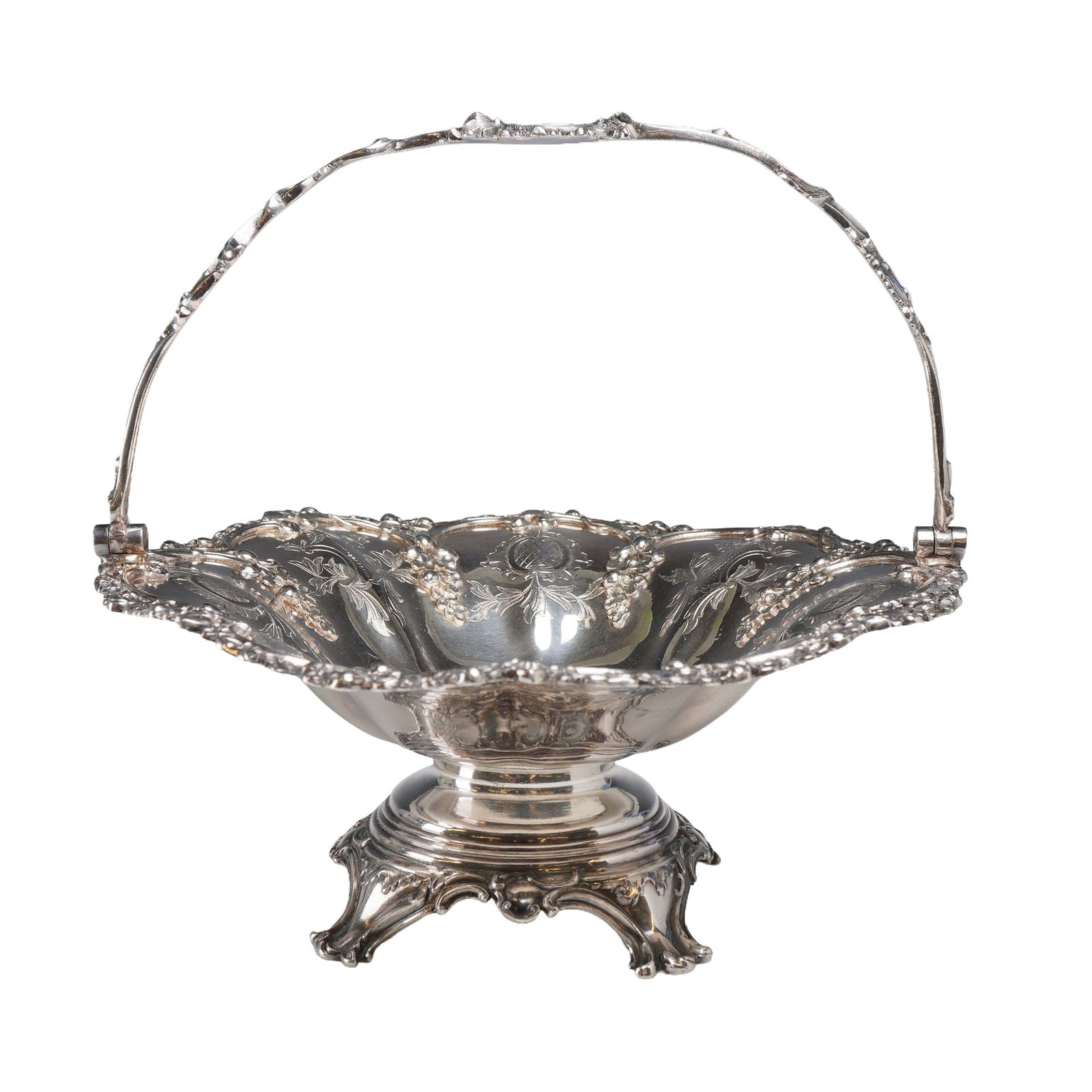 Silver Plated Grapevine Basket: Victorian Rococo Revival style footed cake or fruit basket. The silver plated metal vessel features a lobed bowl decorated with intricate repousse and chased grapevine motifs, including fruit clusters