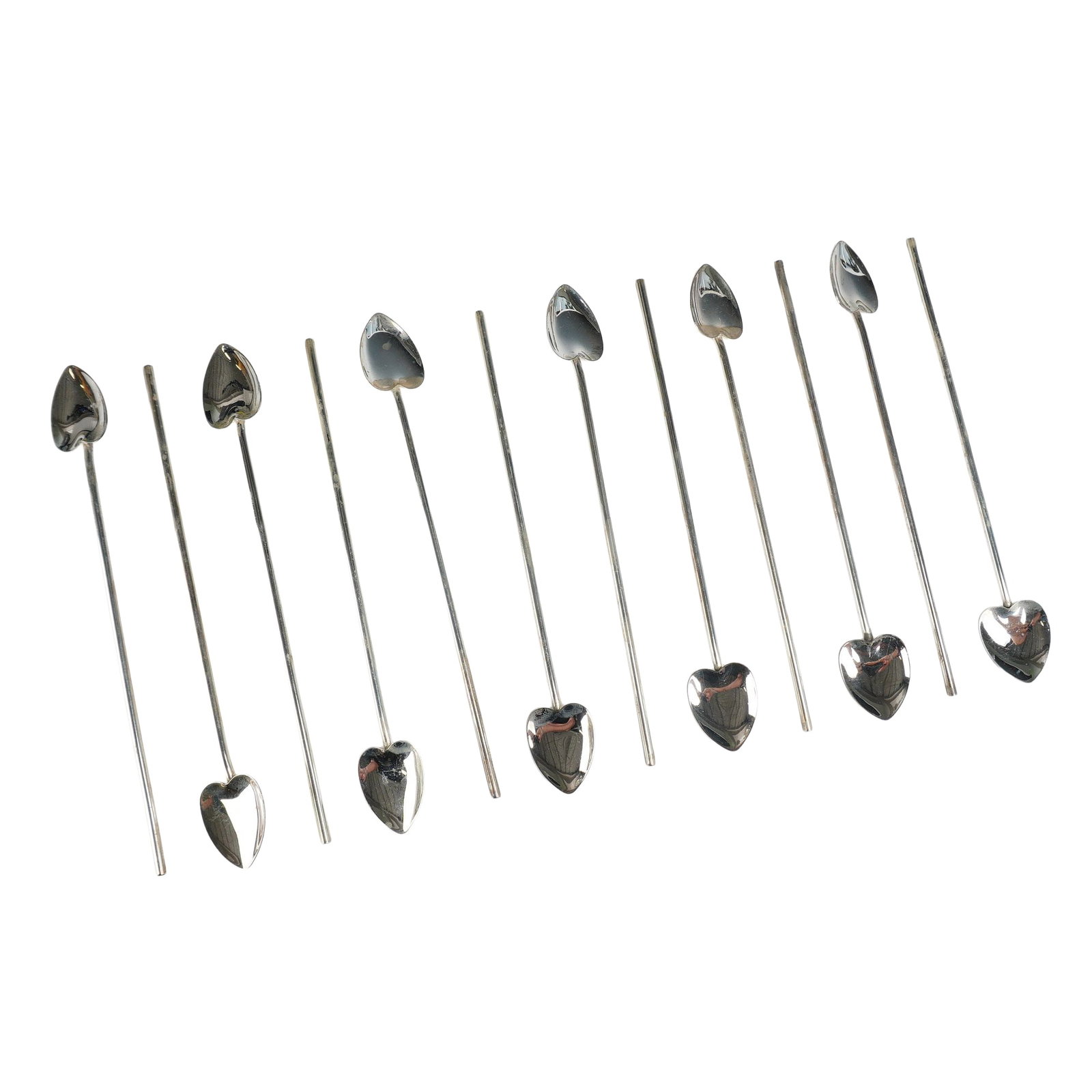 A Set of Twelve Mexican Sterling Silver Heart-Shaped Sipper Straw Spoons: A set of twelve sterling silver cocktail straws, also designed for use as iced tea sipper spoons or drink stirrers. Each piece features a long, hollow cylindrical stem that functions as a straw, attac