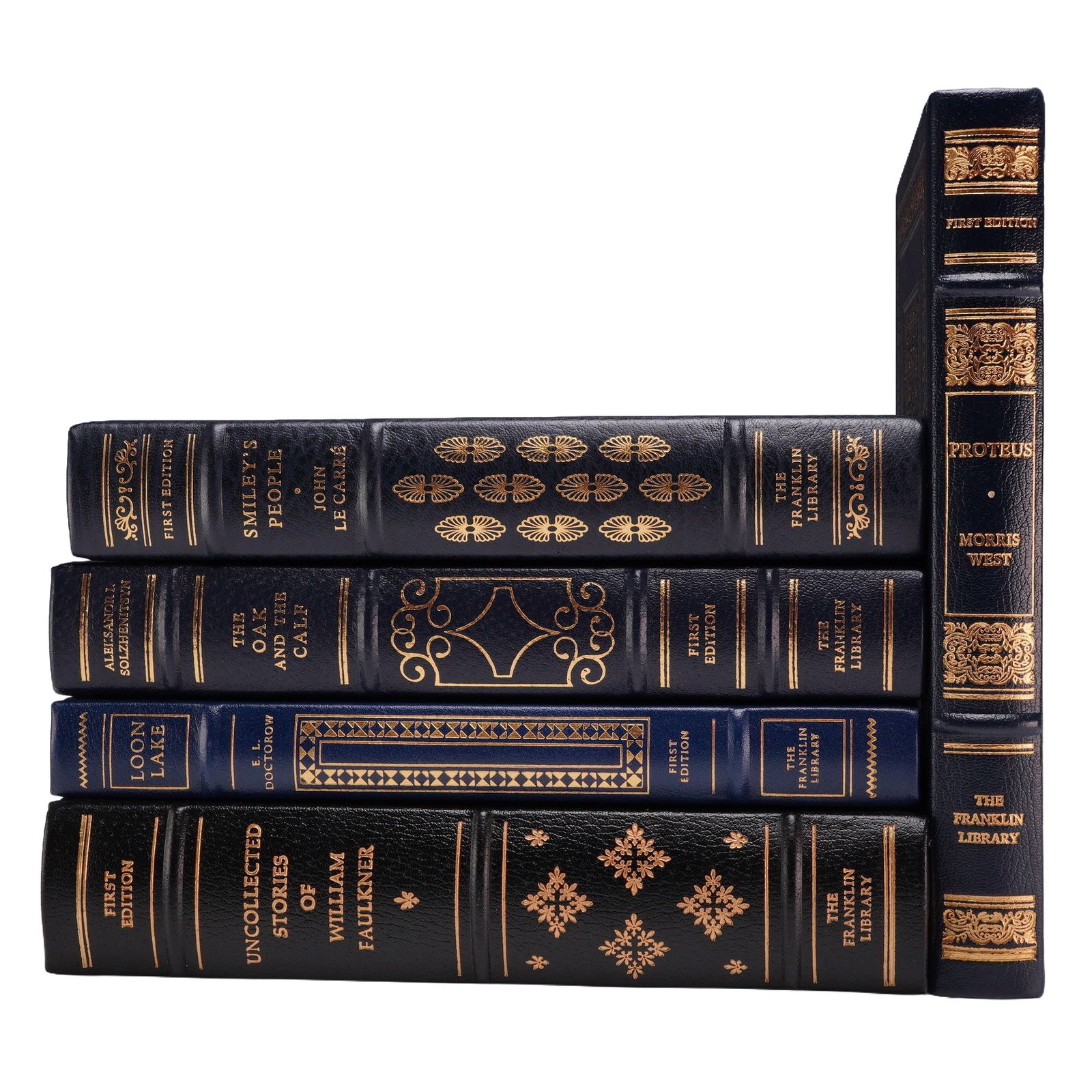 5pc Franklin Library Collection of Leather-Bound First Editions. 1979-1980.: This 5pc book lot features multiple volumes published by The Franklin Library for members of the First Edition Society. The collection includes Smiley's People by John le Carre (1979), The Oak and the