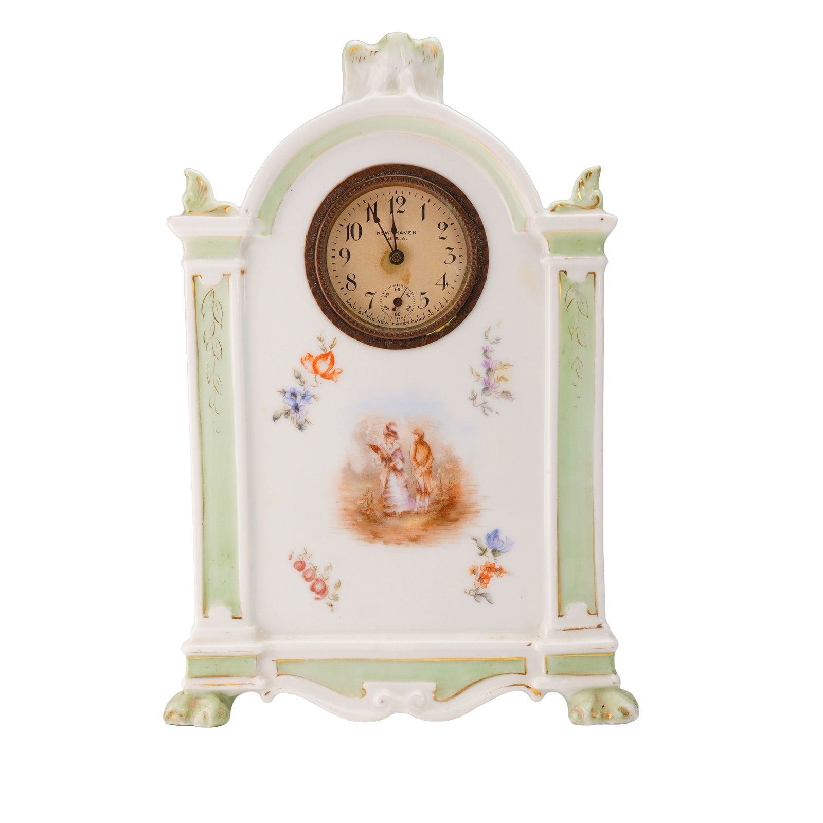 Rosenthal Porcelain Cased Mantel Clock with New Haven Movement: A single glazed porcelain mantel clock featuring an architectural form with an arched pediment and four stylized paw feet. The case is attributed to Rosenthal, Germany, and houses a movement manufactu