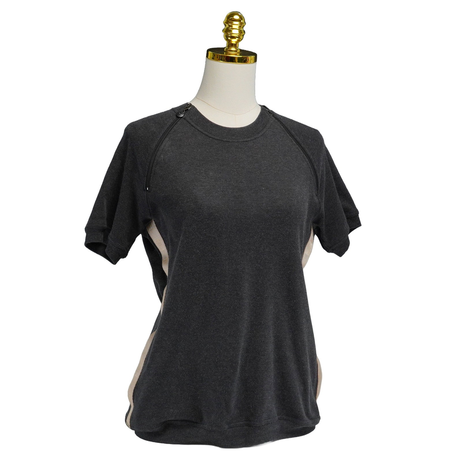 Chanel Charcoal Grey Sweatshirt: The Chanel short-sleeved top (size French 42), from the Fall 2002 Ready to Wear collection, is crafted from a soft charcoal grey knit and features a round neckline with a diagonal zipper at the right 