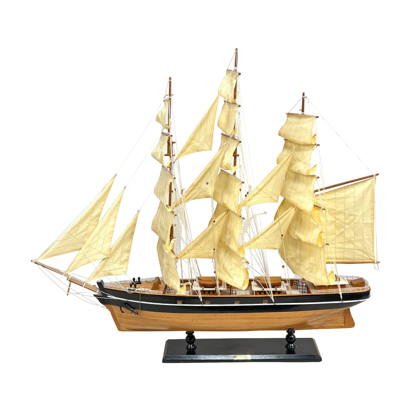 Handcrafted Wood Model of the Cutty Sark British Clipper Ship: This handcrafted wood model represents the British clipper ship Cutty Sark. The hull is constructed of wood with a black-painted upper section and a natural stained finish below the waterline. The