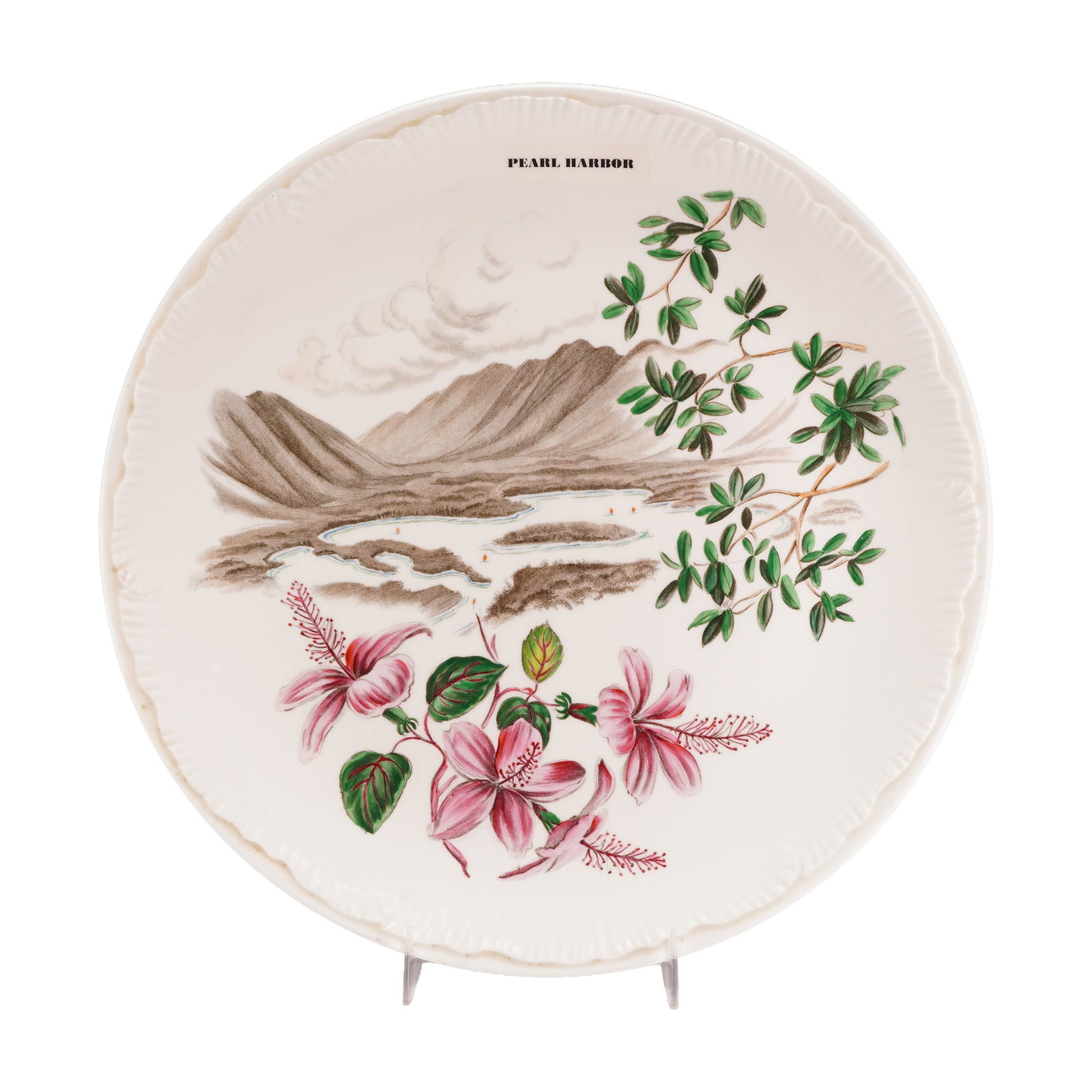 Wedgwood Limited Edition Pearl Harbor Commemorative Bone China Plate: This Wedgwood bone china commemorative wall plate was manufactured in England for Detor Jewelers Ltd. of Honolulu, Hawaii. The circular plate features a fluted rim and a central landscape scene of Pea