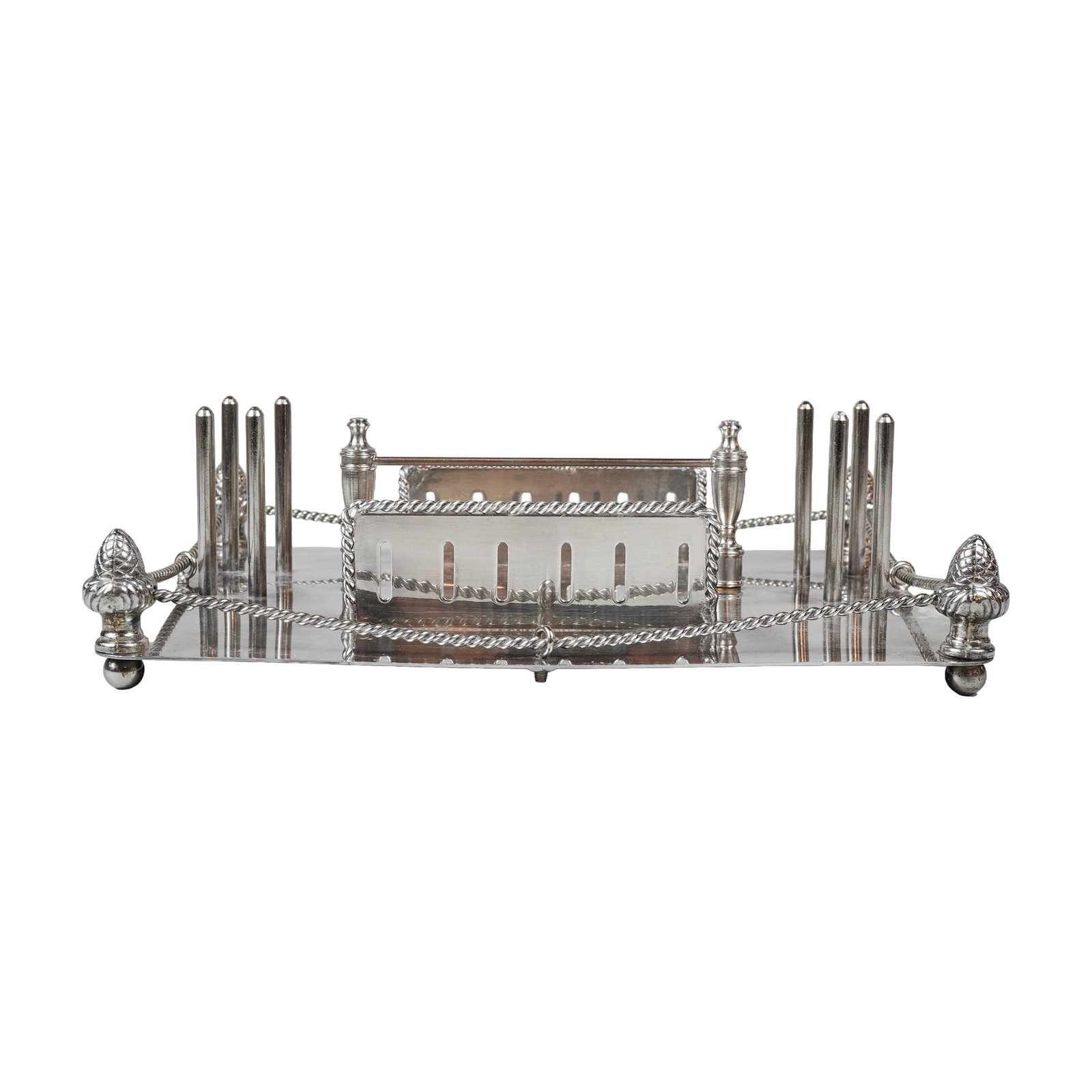 Silverplated Novelty Desk Stand with Acorn Finials: A silver-plated novelty desk organizer featuring a rectangular base raised on four spherical ball feet. The perimeter is enclosed by a decorative twisted rope-form gallery supported by four corner pos