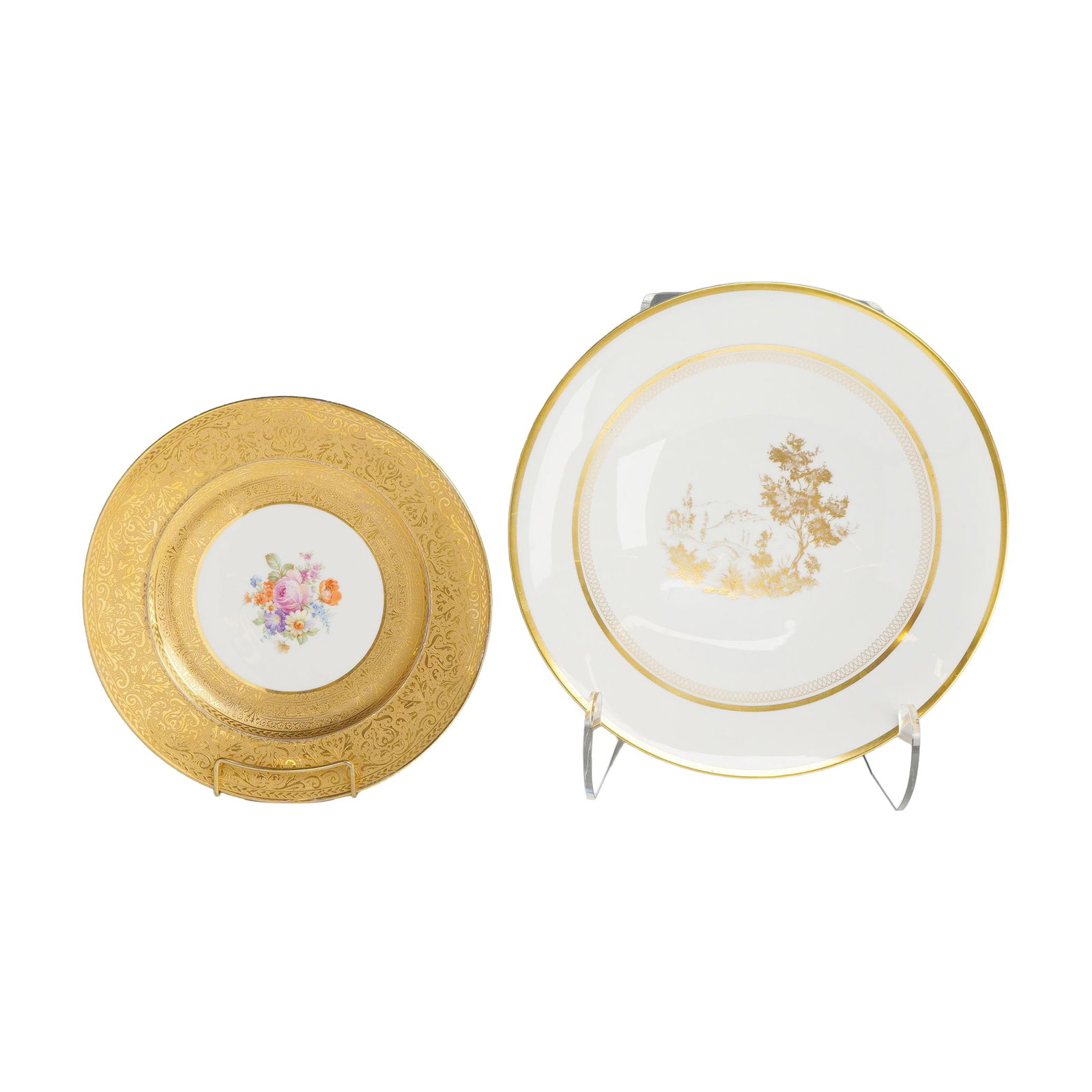 2pc Royal Bavarian Hutschenreuther Selb Bavaria Gilded Porcelain Dishes: This group consists of two German porcelain decorative items manufactured by Hutschenreuther in Selb, Bavaria. The first item is a gold plate featuring a wide, heavily gilded border with intricate fol