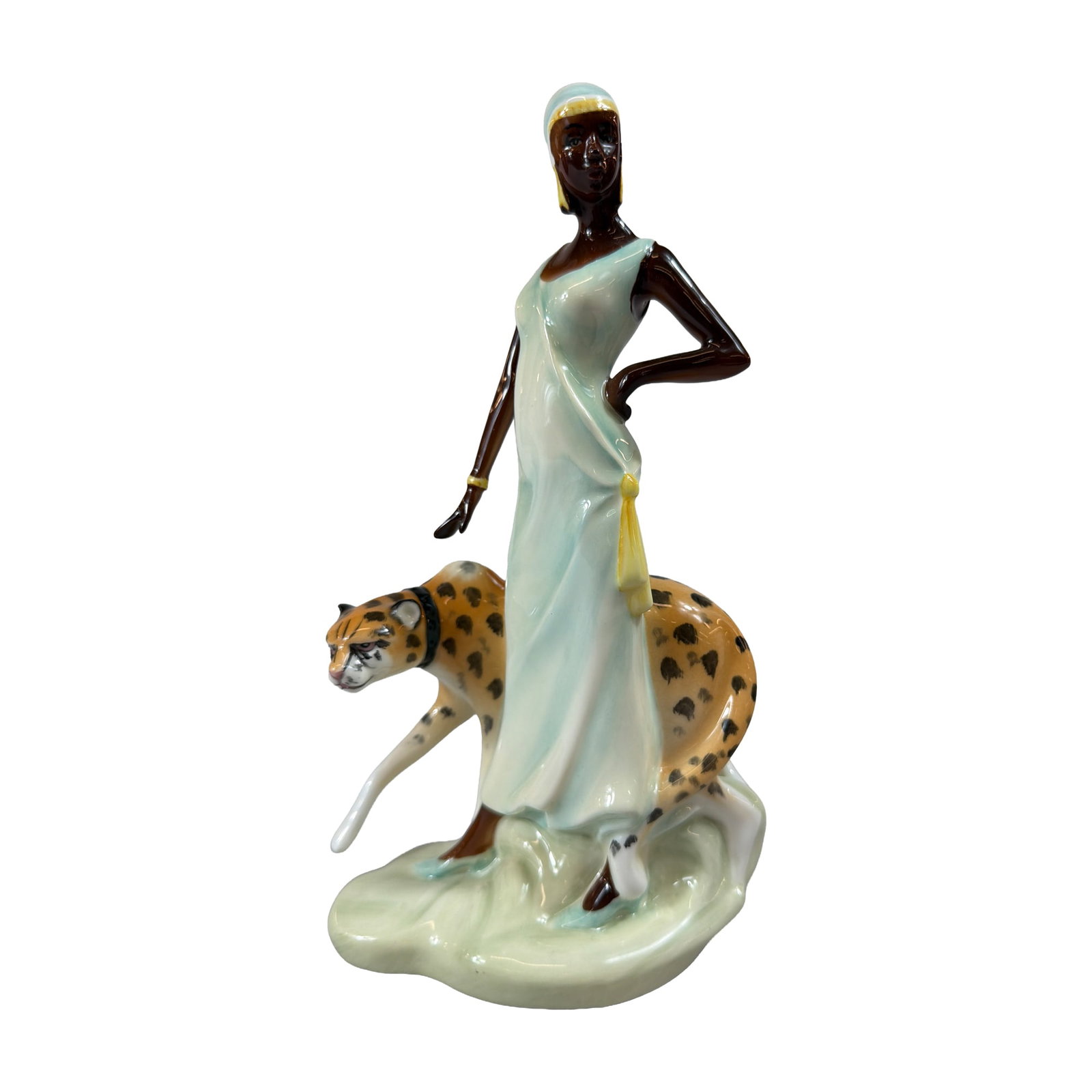 Royal Doulton Charlotte Porcelain Figurine HN 3810: Royal Doulton glazed bone china figurine, titled Charlotte, model number HN 3810, designed by Alan Maslankowski. The Art Deco style figure depicts a standing woman wearing a flowing pale ice-blue gown