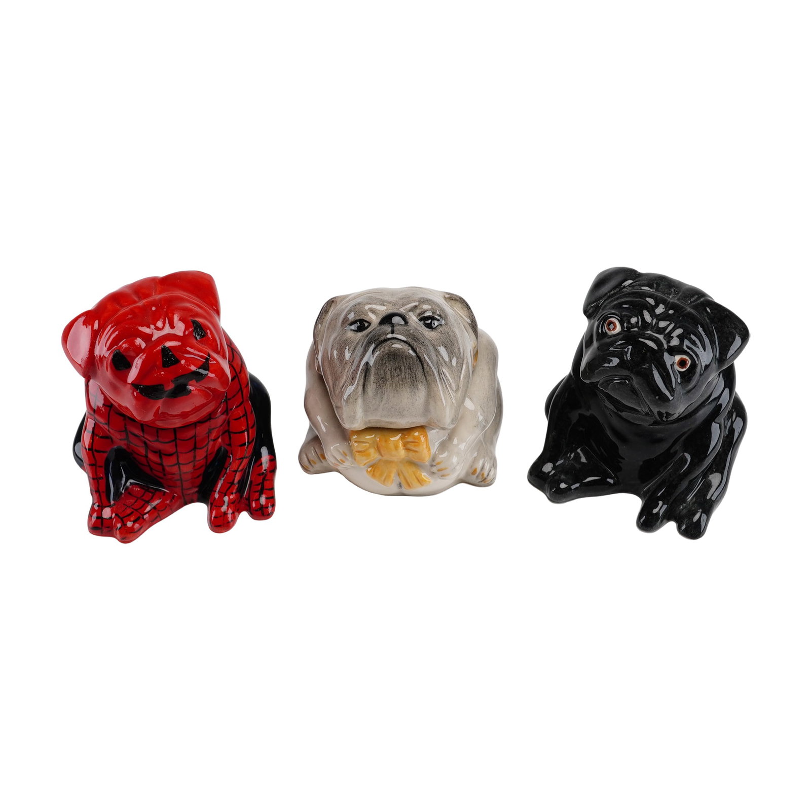 Lot of Three Kevin Francis Face Pots Trinket Boxes, Bulldog and Pugs: Each item features a two-piece construction with a removable lid modeled as a dog head and a base representing the shoulders and torso. The first pot is modeled as a pug wearing a red and black Spider