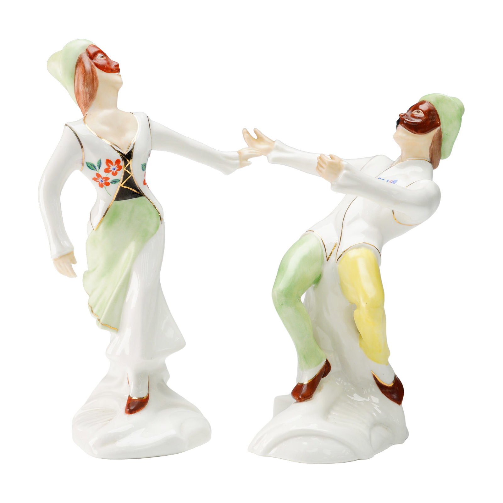 Pair of Michael Sutty Porcelain Figurines, Harlequin and Columbine: Pair of porcelain figurines by Michael Sutty, depicting Harlequin and Columbine, characters from the traditional Commedia dell'Arte. Each figure is crafted in glazed porcelain and features theatrical 