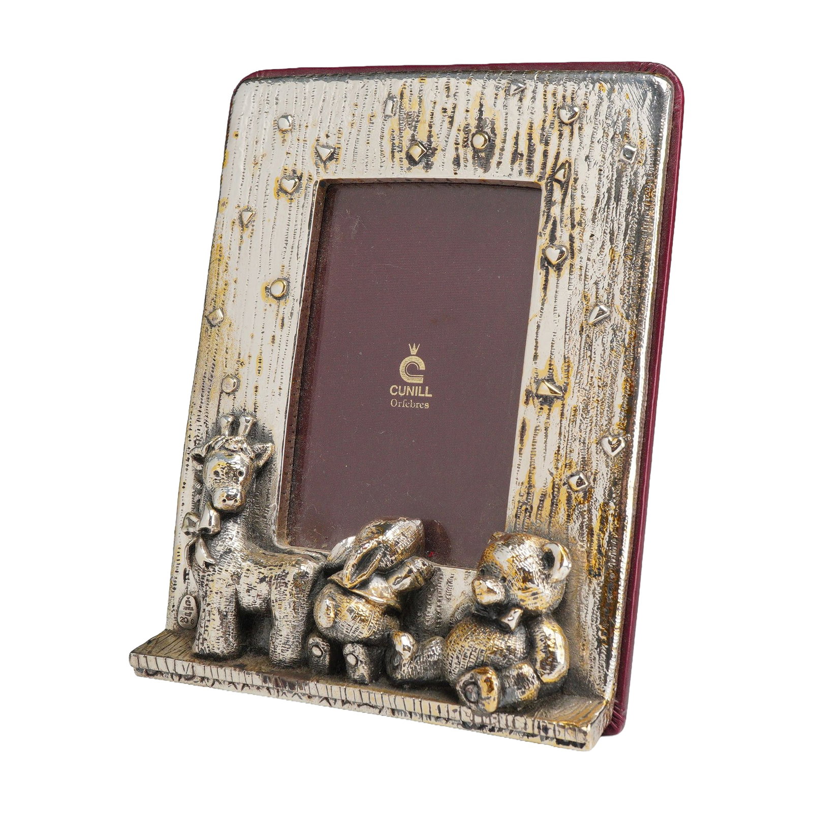 Cunill Orfebres Sterling Silver Nursery Photo Frame with Teddy Bear Rabbit and Giraffe: A sterling silver photo frame by Cunill Orfebres featuring a whimsical nursery-themed design. The frame front is finished with a deeply textured bark-like pattern accented by embossed hearts and geome