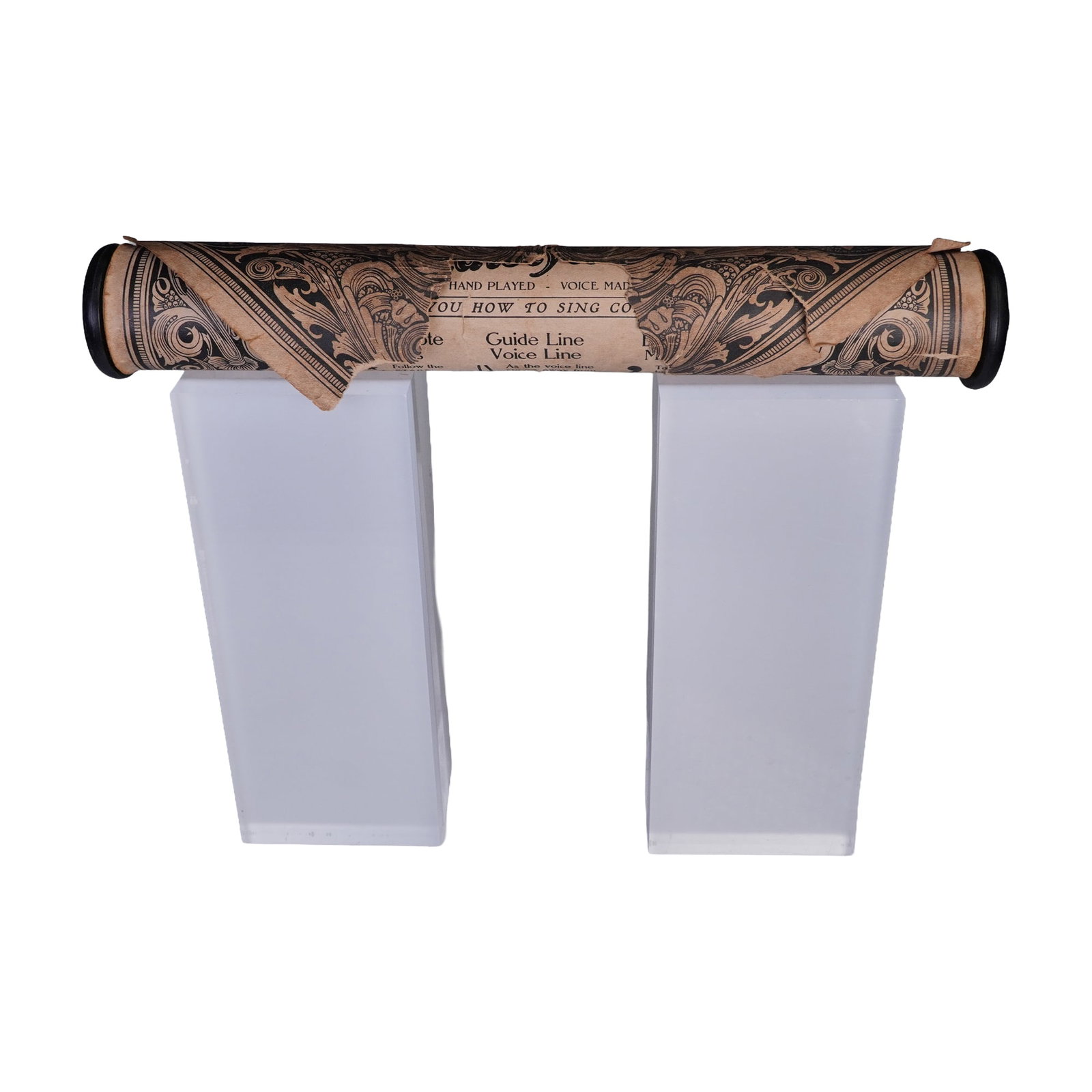 Vocalstyle Player Piano Song Roll - Shows You How to Sing Correctly: Vocalstyle player piano song roll. A vintage 12-inch paper piano roll produced by Vocalstyle Music Company, titled Shows You How to Sing Correctly. This roll is marked No. 12713 and was played by Buck