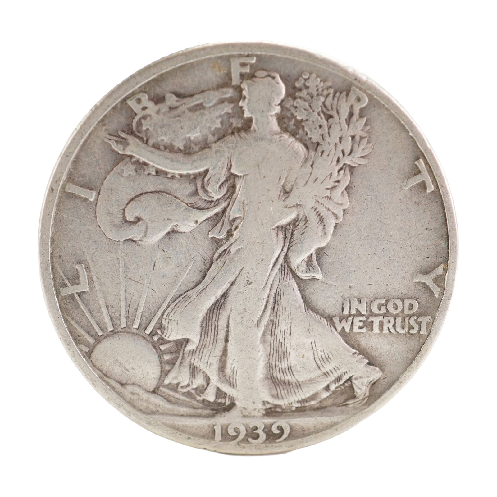 1939 U.S. Walking Liberty Half Dollar 90% Silver Coin, Circulated: Design includes obverse Liberty walking to the left with date below; Reverse has Eagle with wings spread and denomination below. Total weight 12g. Dimensions: 30.6mm Date or Era: 1939 Country of Origi