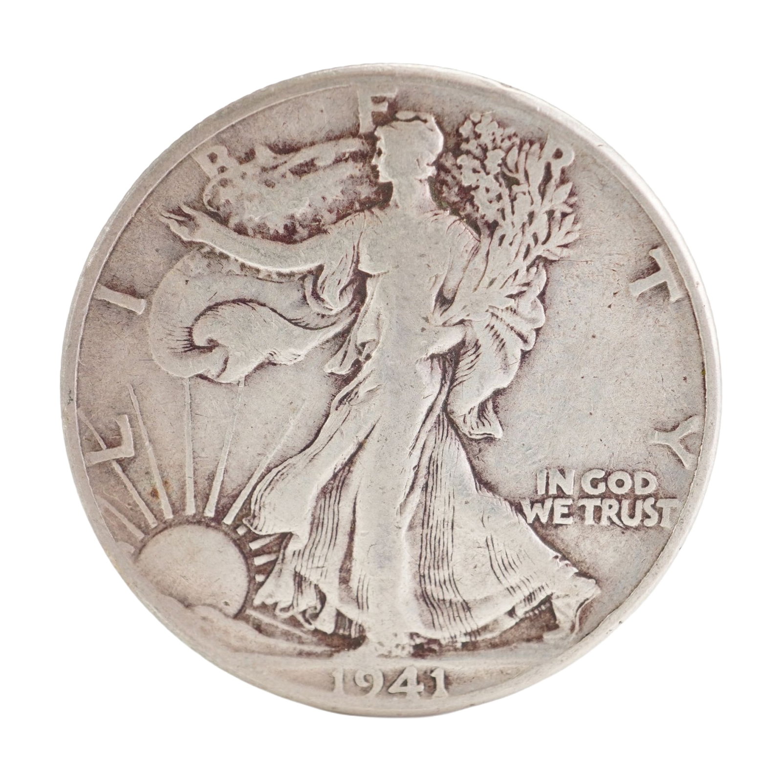 1941 U.S. Walking Liberty Half Dollar 90% Silver Coin, Circulated: Design includes obverse Liberty walking to the left with date below; Reverse has Eagle with wings spread and denomination below. Total weight 12g. Dimensions: 30.6mm Date or Era: 1941 Country of Origi